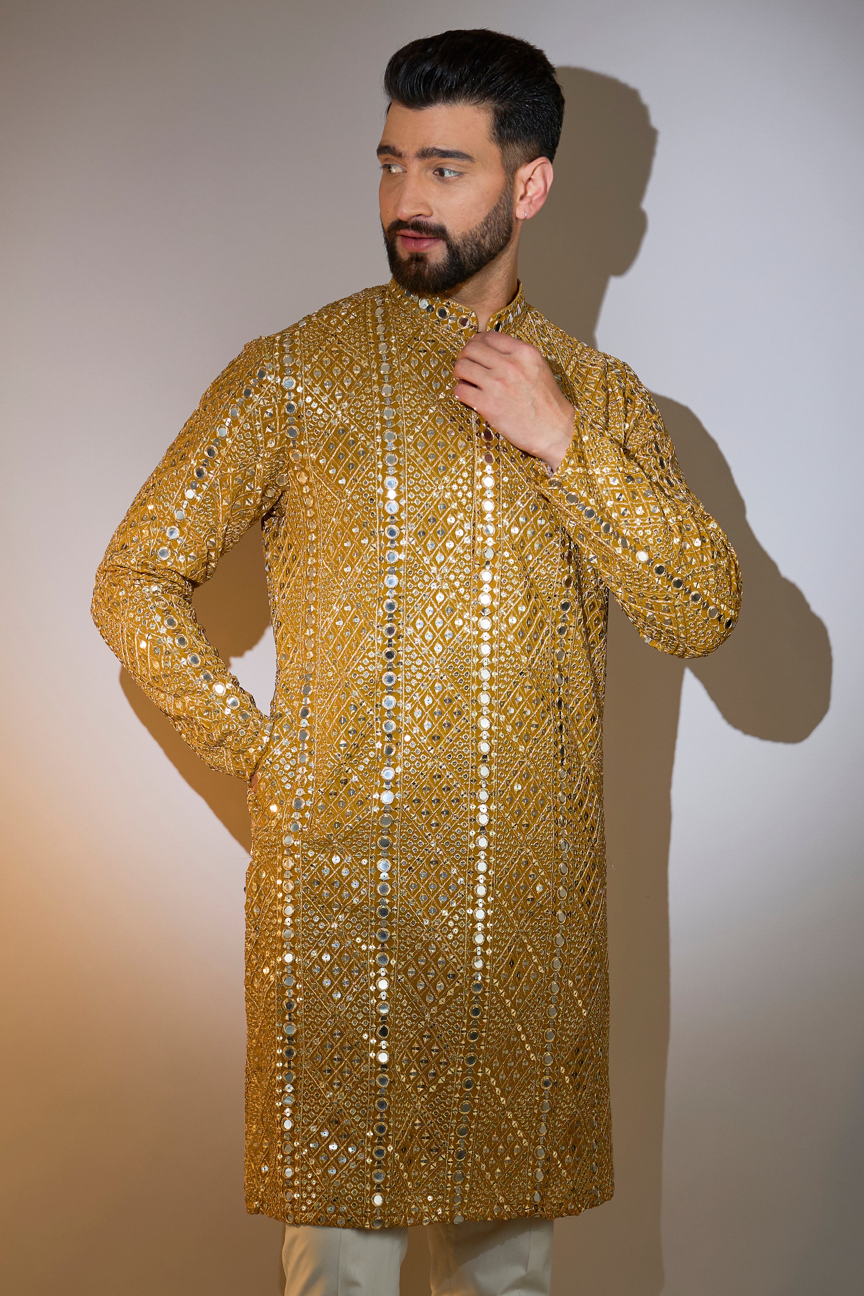mustard mirror work kurta with intricate zari work