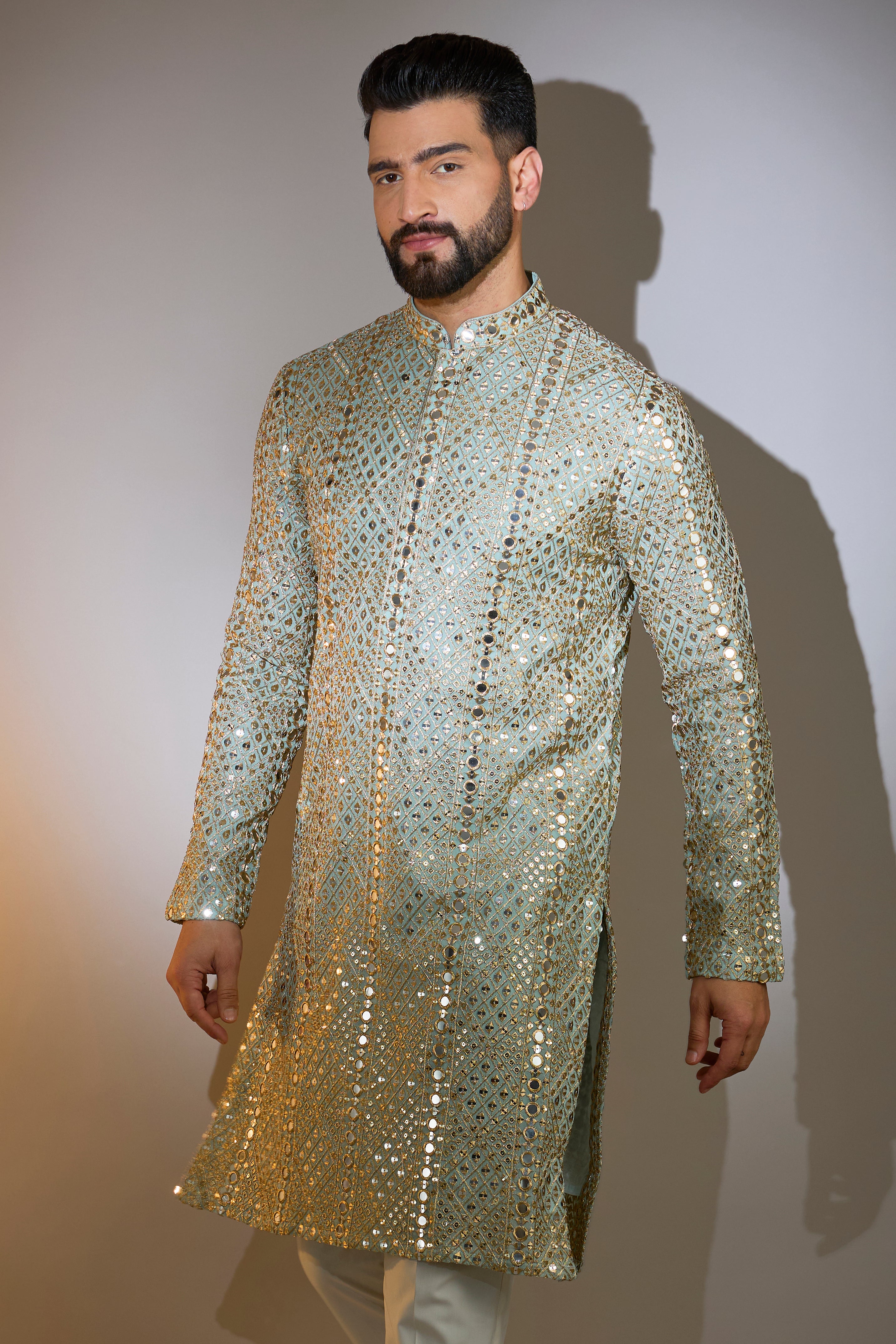 blue mirror work kurta with heazy zari detailing