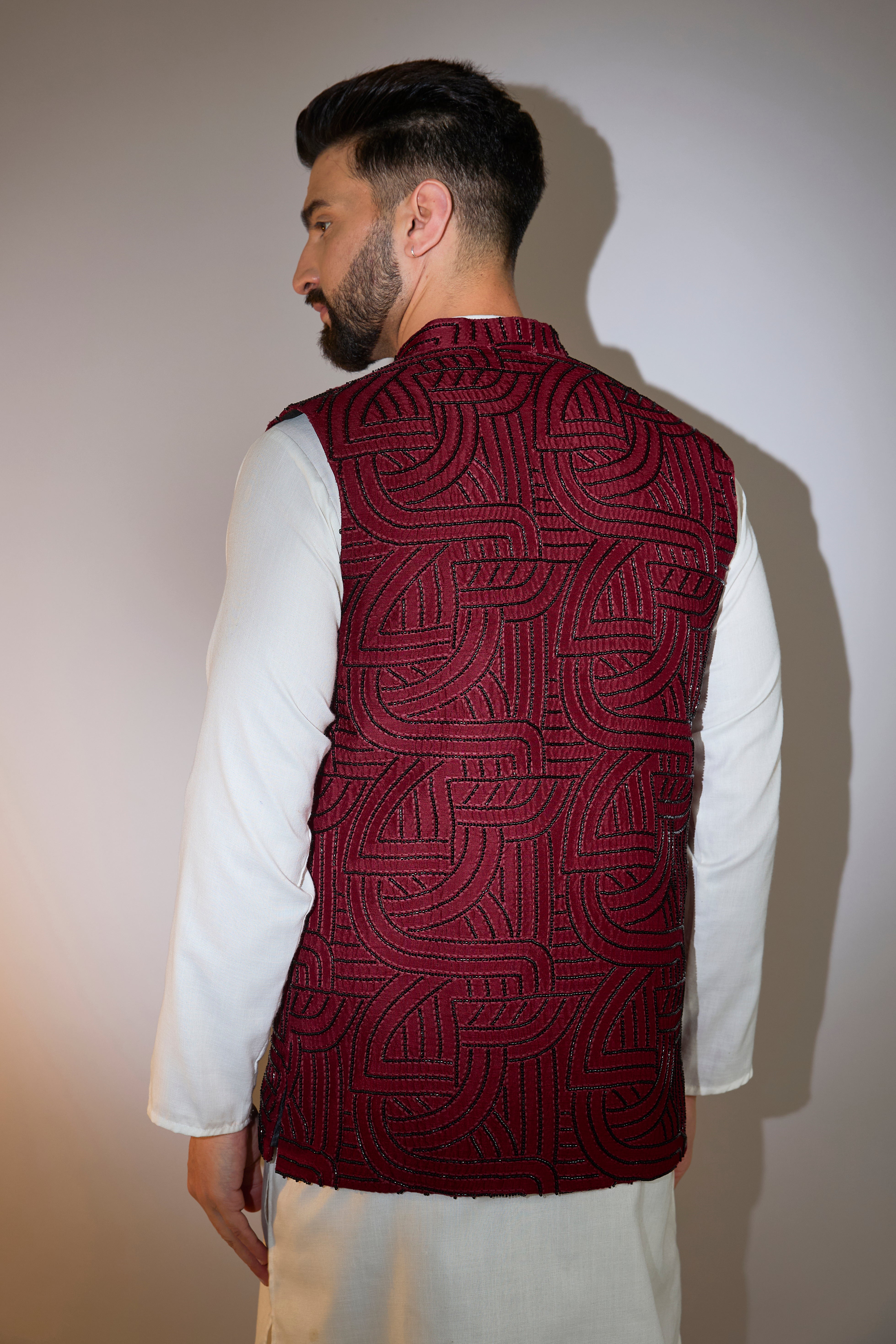 maroon short jacket with intricate cut dana embroidery