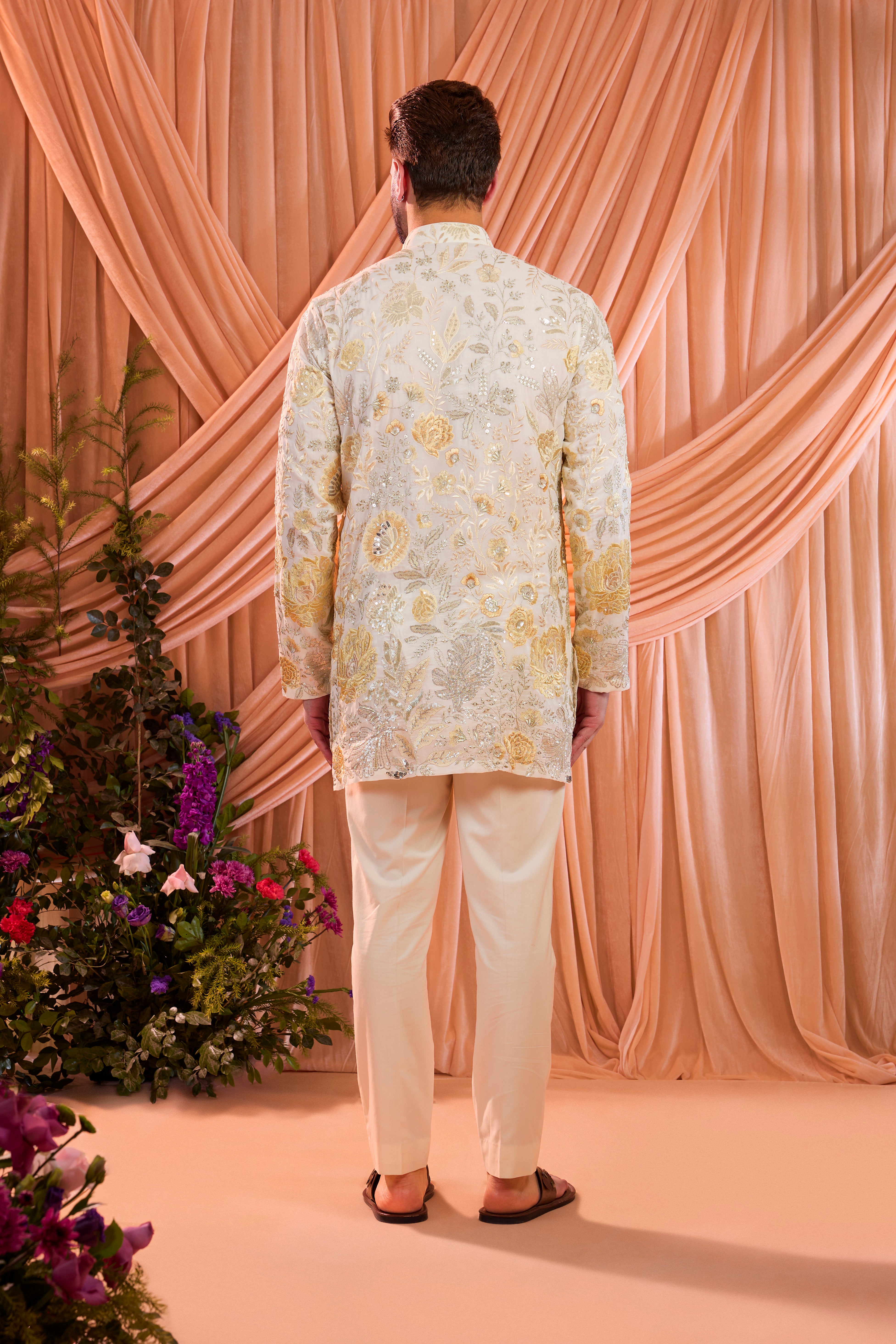 White chikankari kurta with detailed floral embroidery