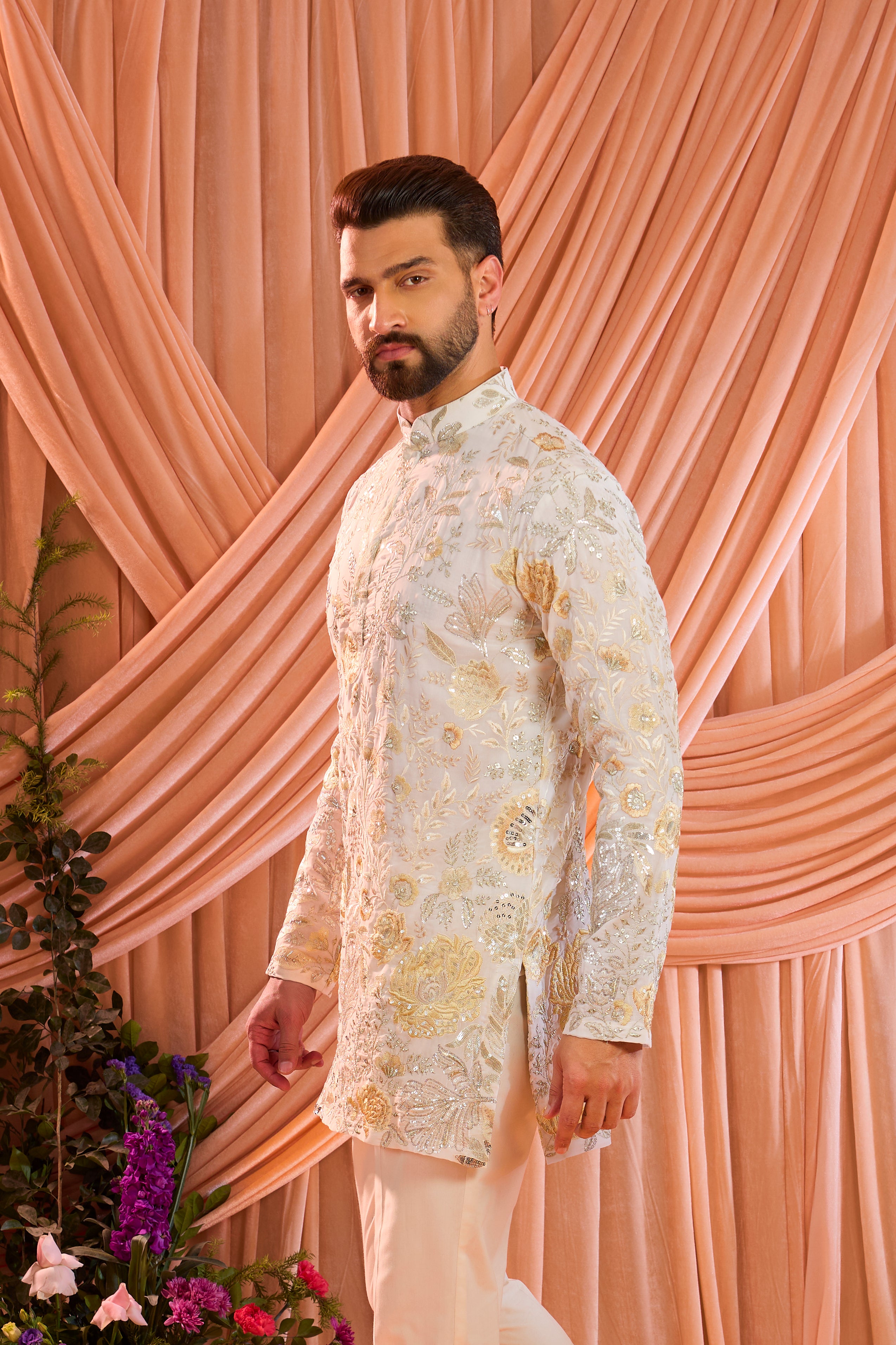 White chikankari kurta with detailed floral embroidery