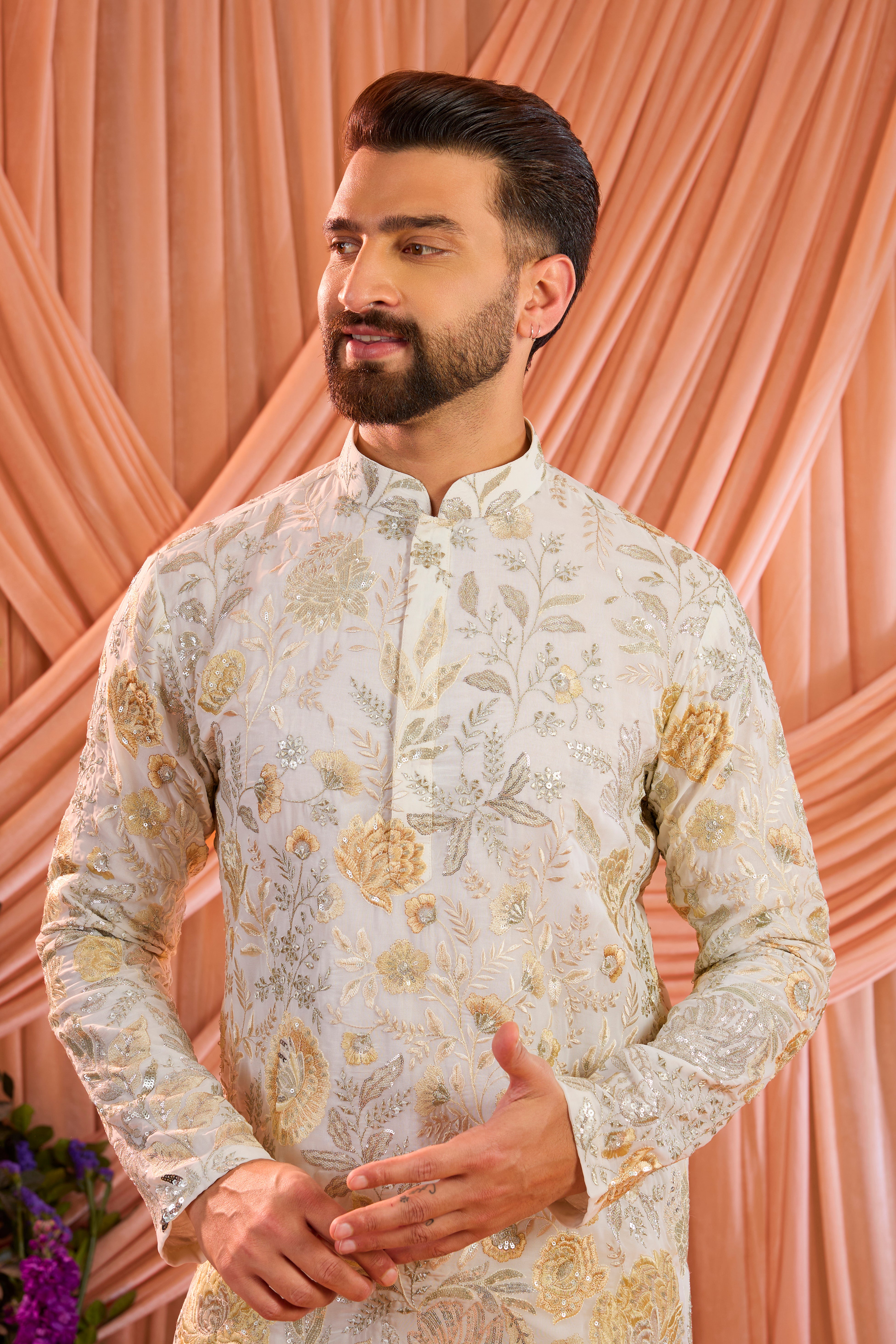 White chikankari kurta with detailed floral embroidery