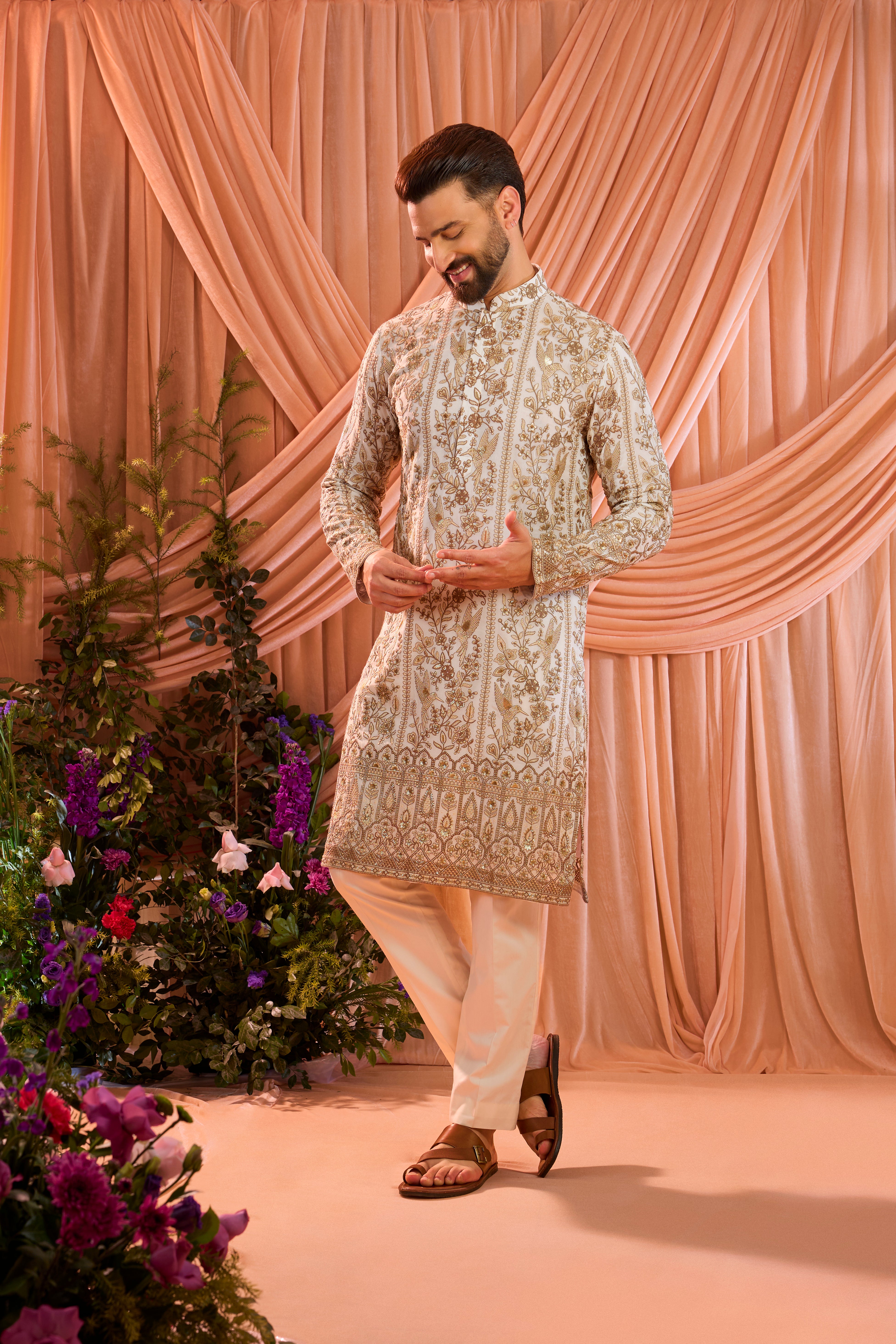 White chikankari kurta with detailed flora & fauna embroidery