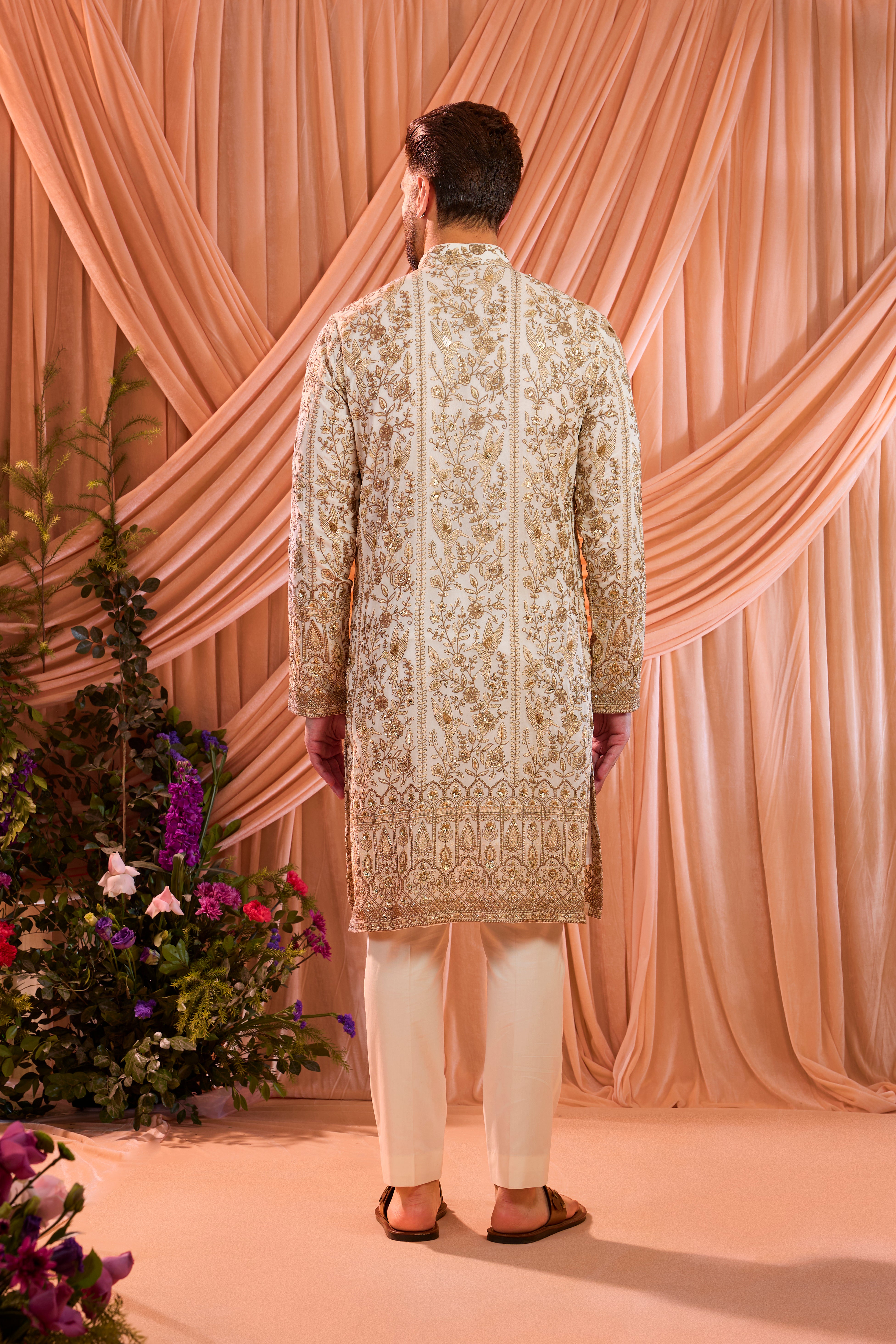 White chikankari kurta with detailed flora & fauna embroidery