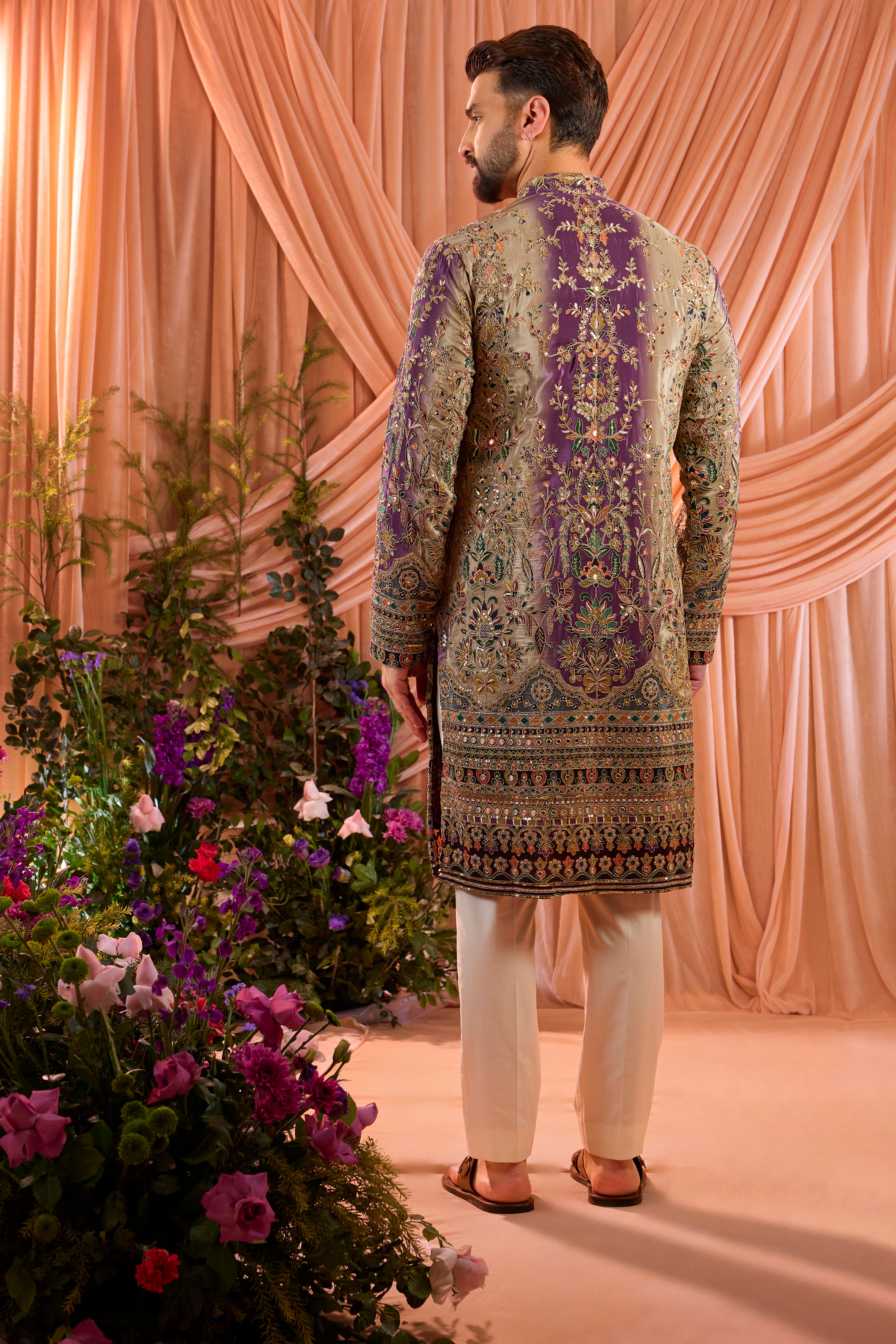 Purple and gold kurta with detailed floral embroidery and zari