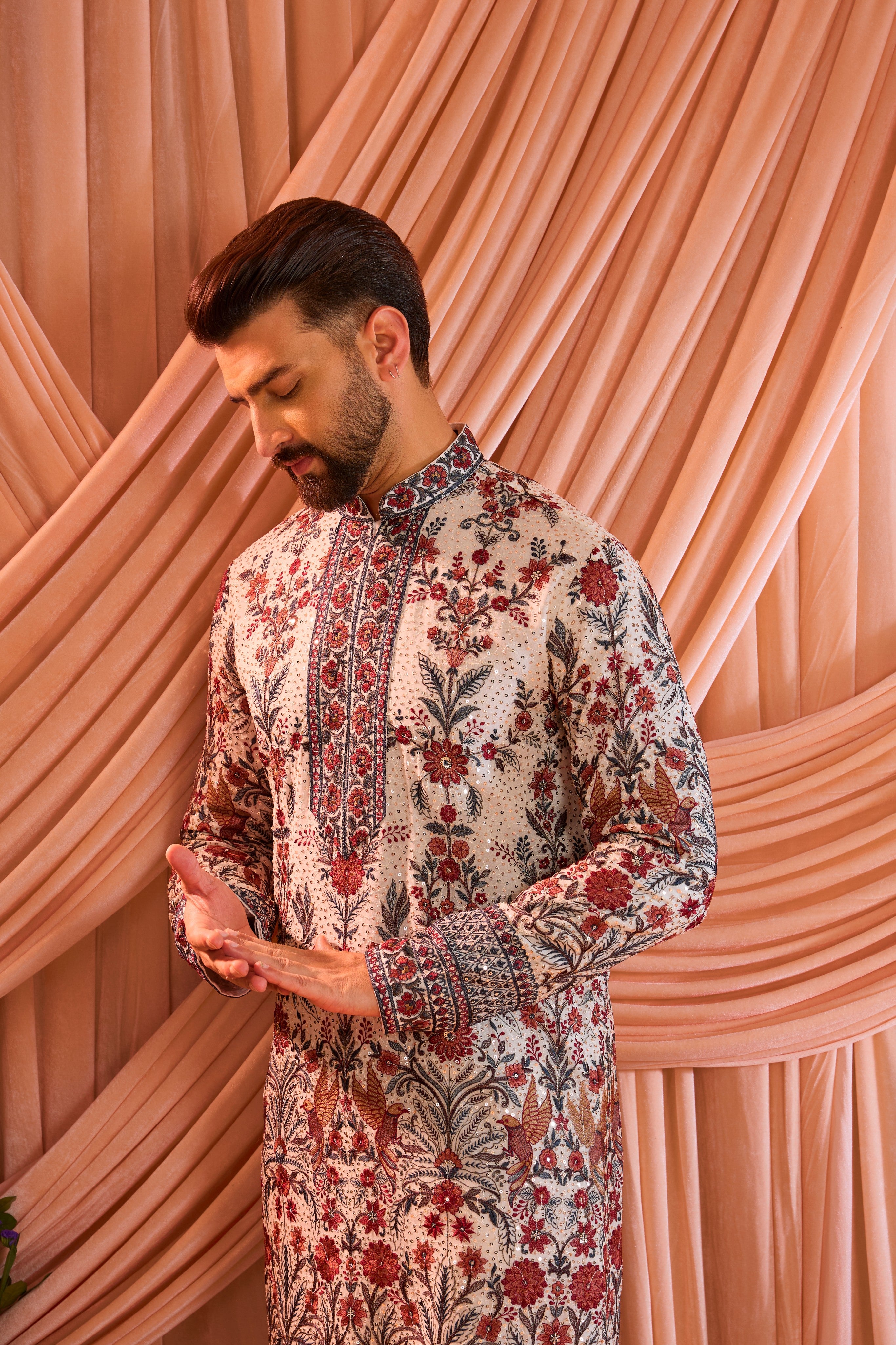White chikankari kurta with detailed floral embroidery and sequin