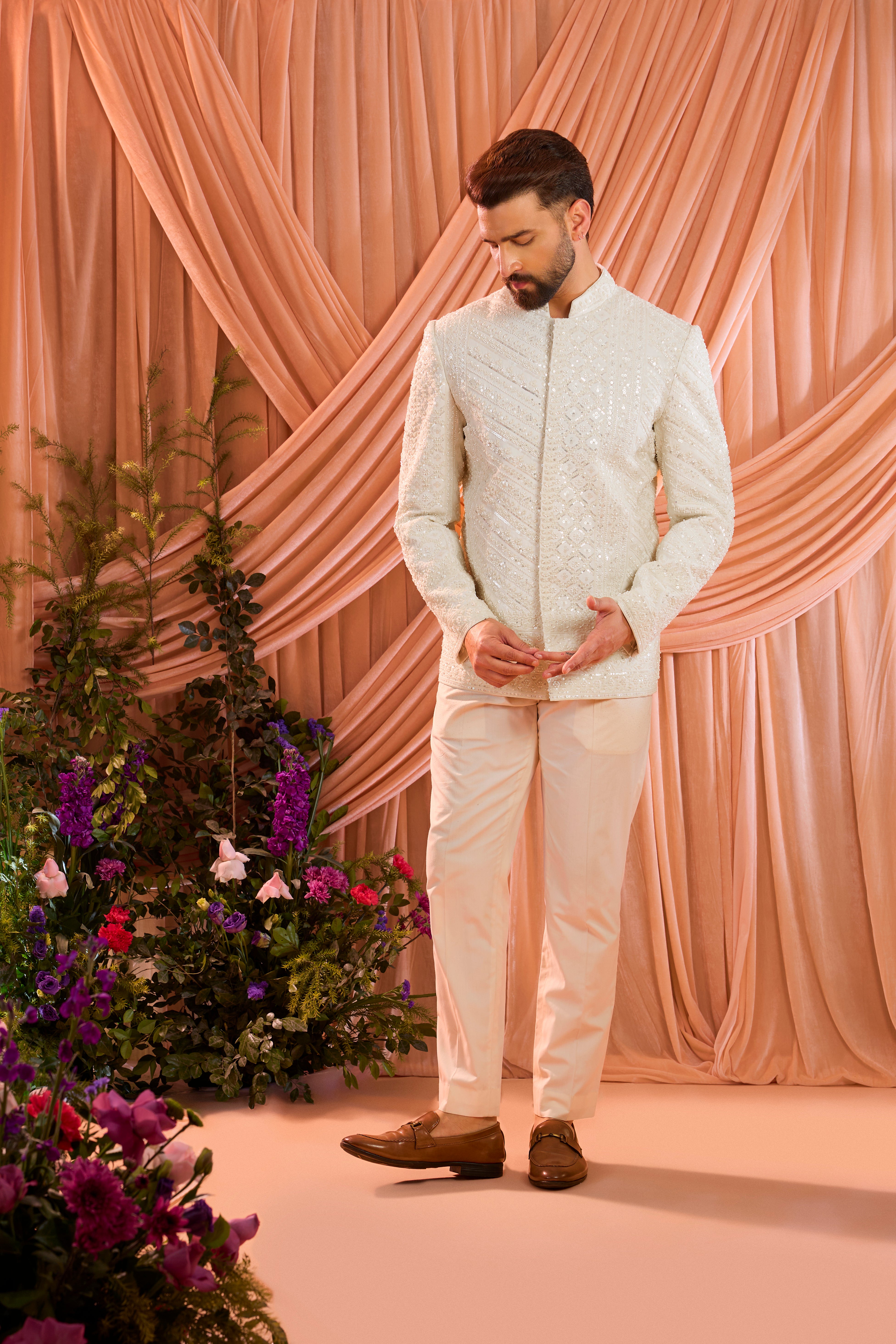 Ivory hand-embroidered formal short bandgala jacket, exquisitely adorned with intricate ivory cut-dana detailing.