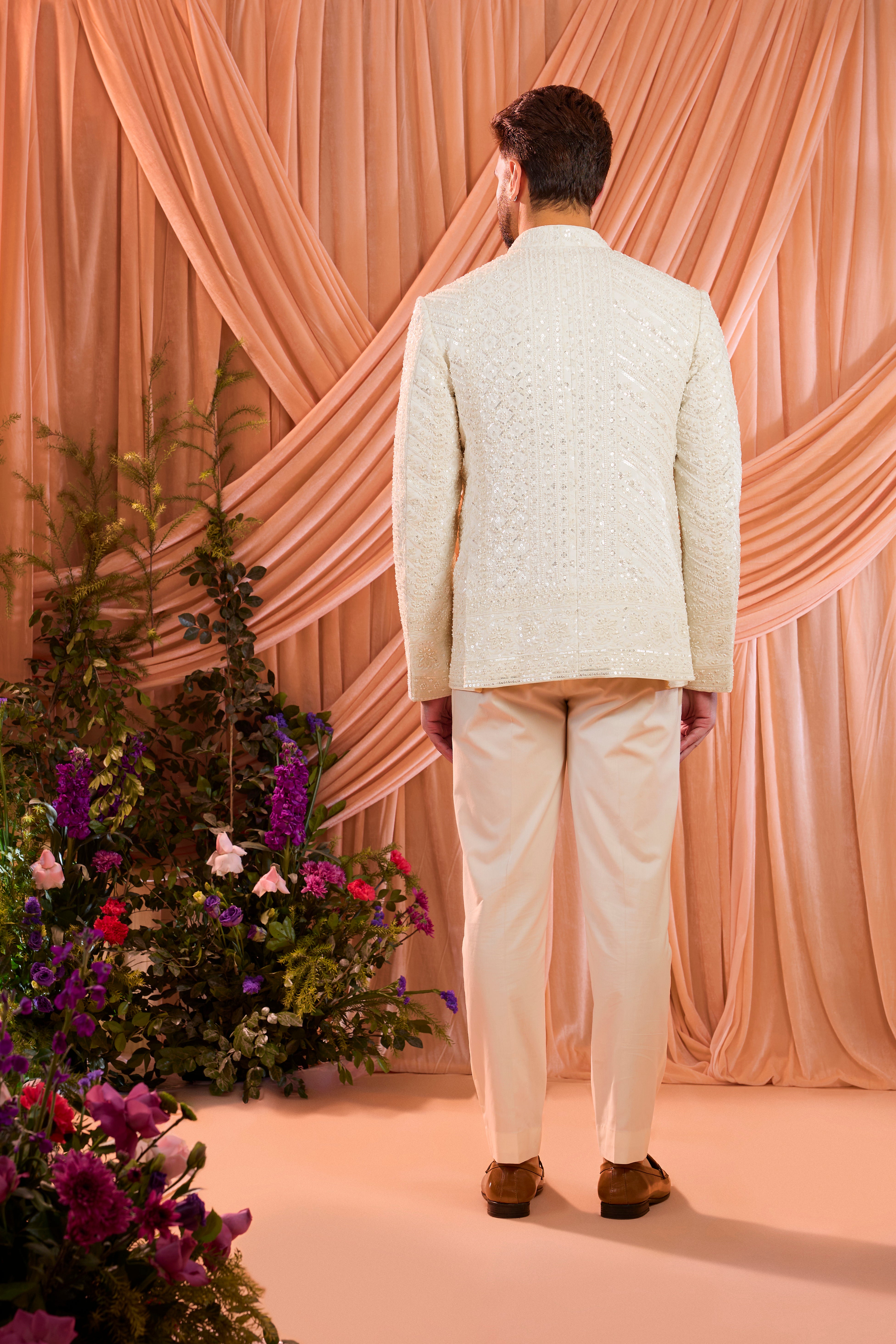 Ivory hand-embroidered formal short bandgala jacket, exquisitely adorned with intricate ivory cut-dana detailing.