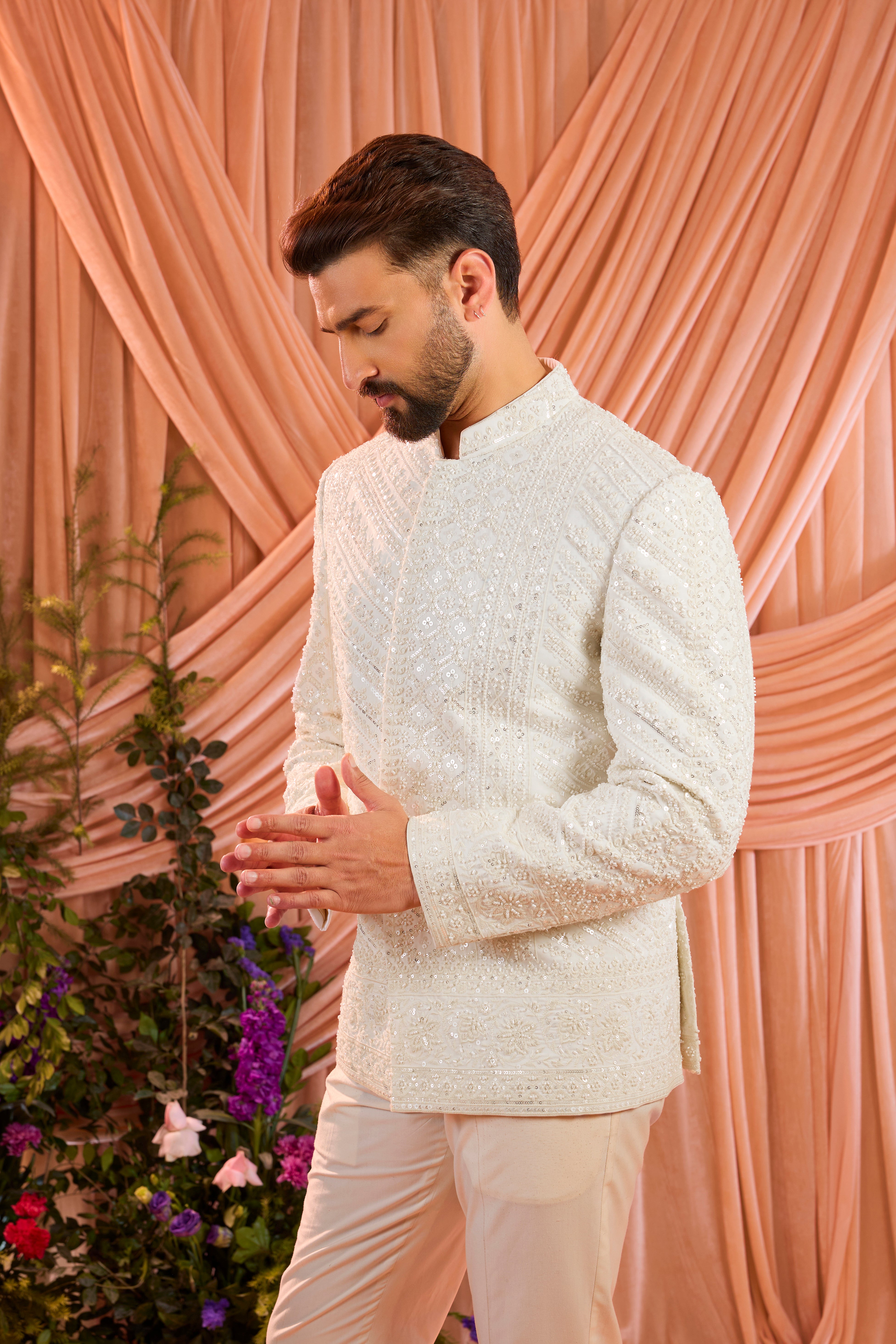 Ivory hand-embroidered formal short bandgala jacket, exquisitely adorned with intricate ivory cut-dana detailing.