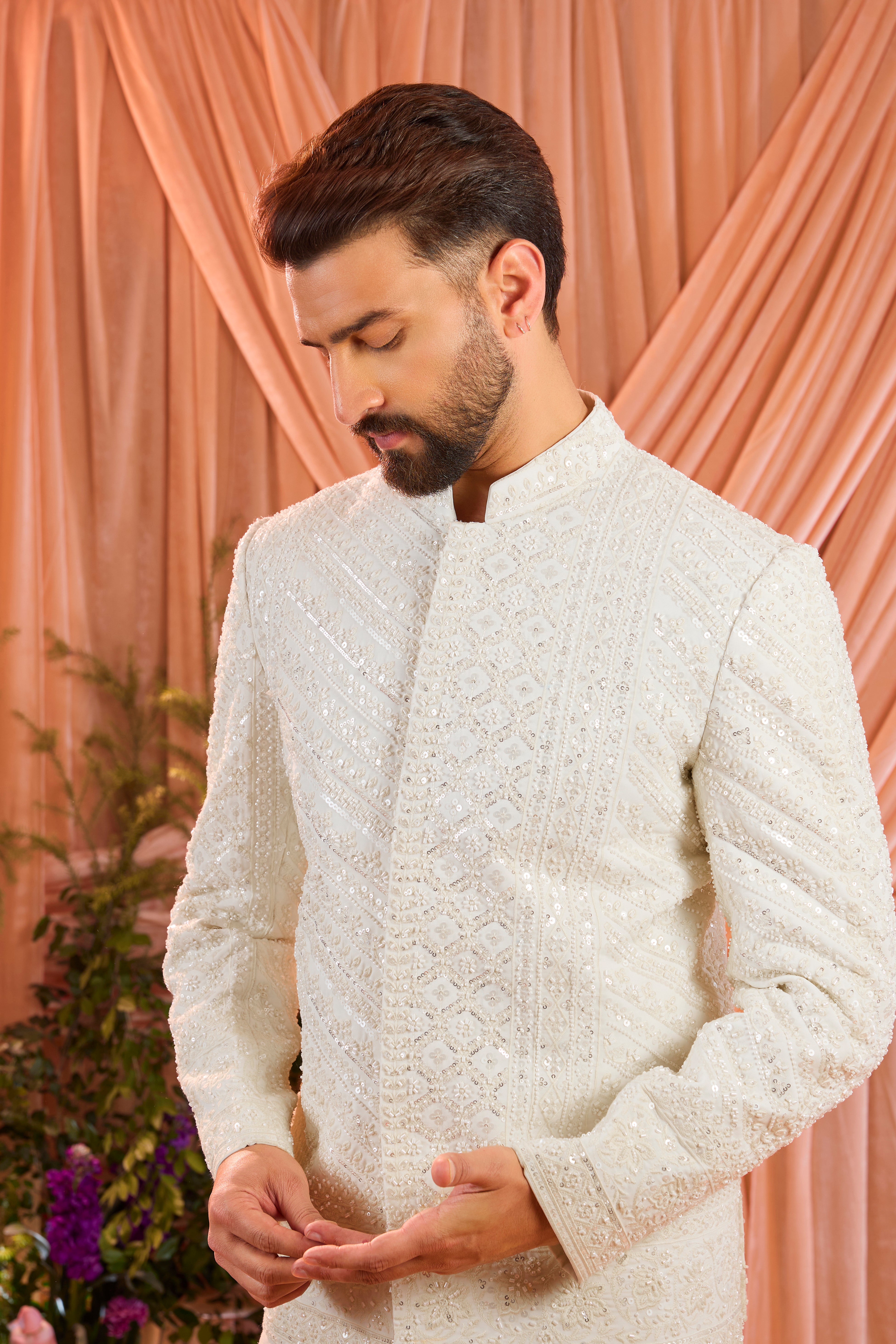 Ivory hand-embroidered formal short bandgala jacket, exquisitely adorned with intricate ivory cut-dana detailing.