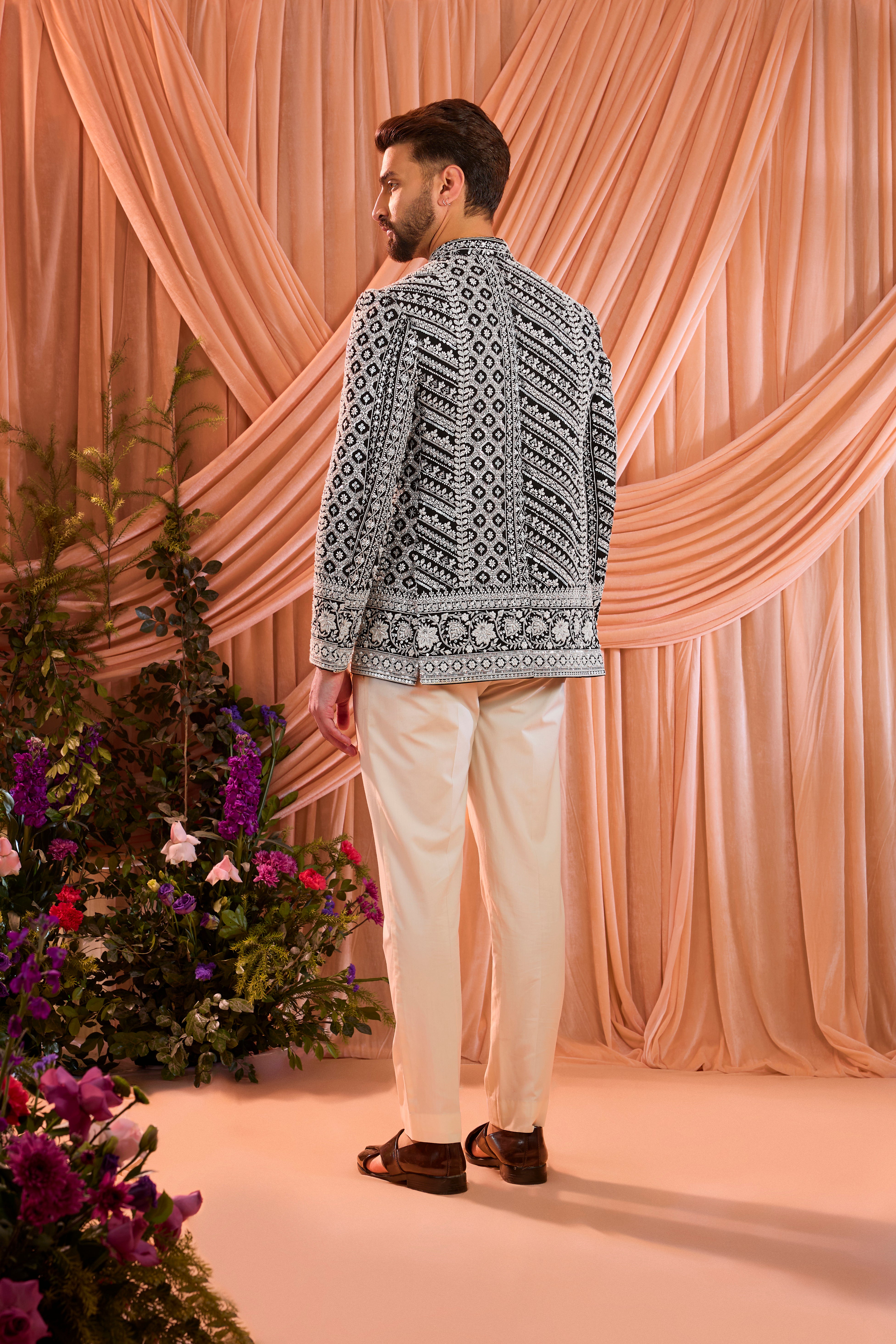 Black hand-embroidered formal bandgala jacket , exquisitely adorned with intricate ivory cut-dana detailing.