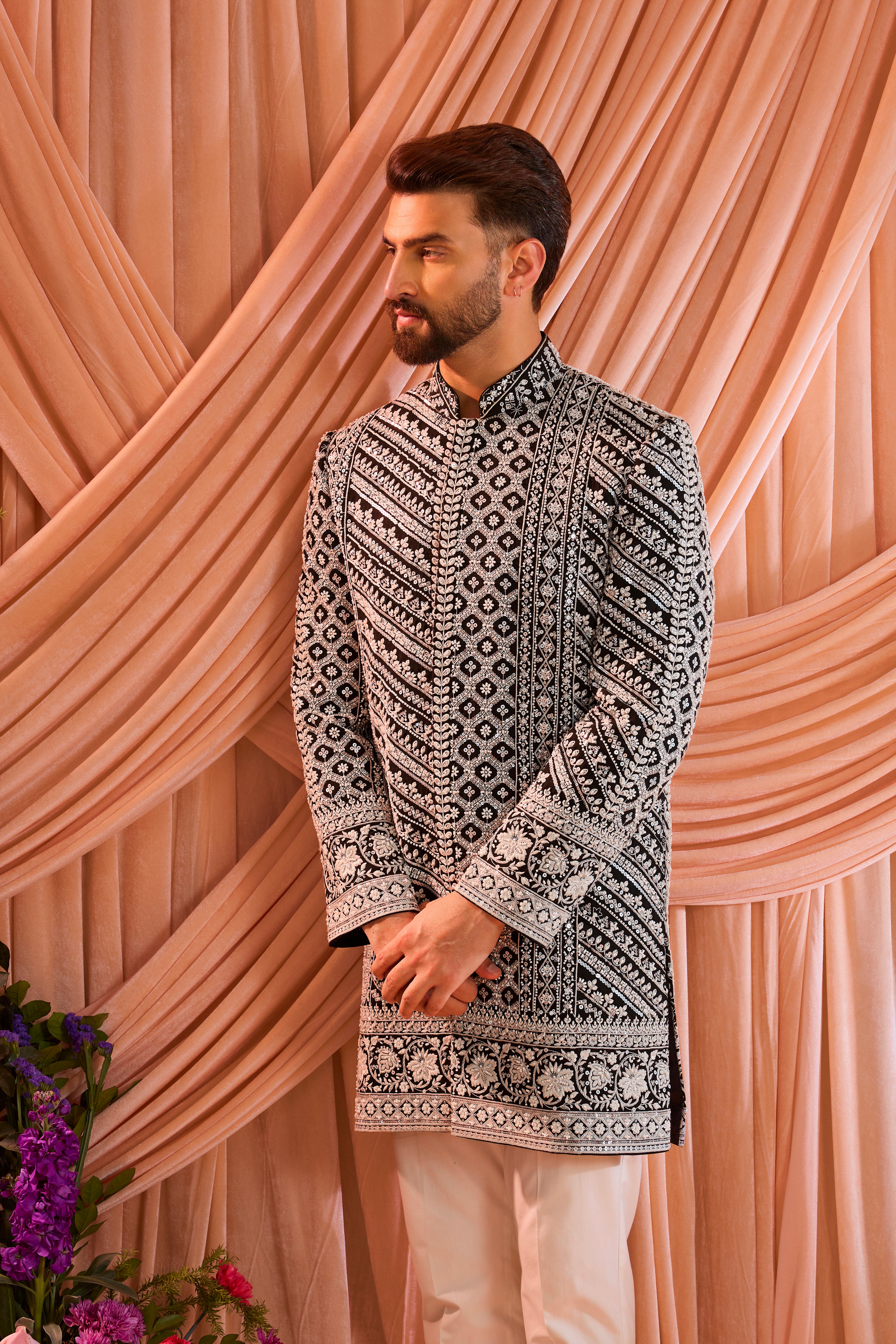 Black hand-embroidered formal short sherwani , exquisitely adorned with intricate ivory cut-dana detailing.