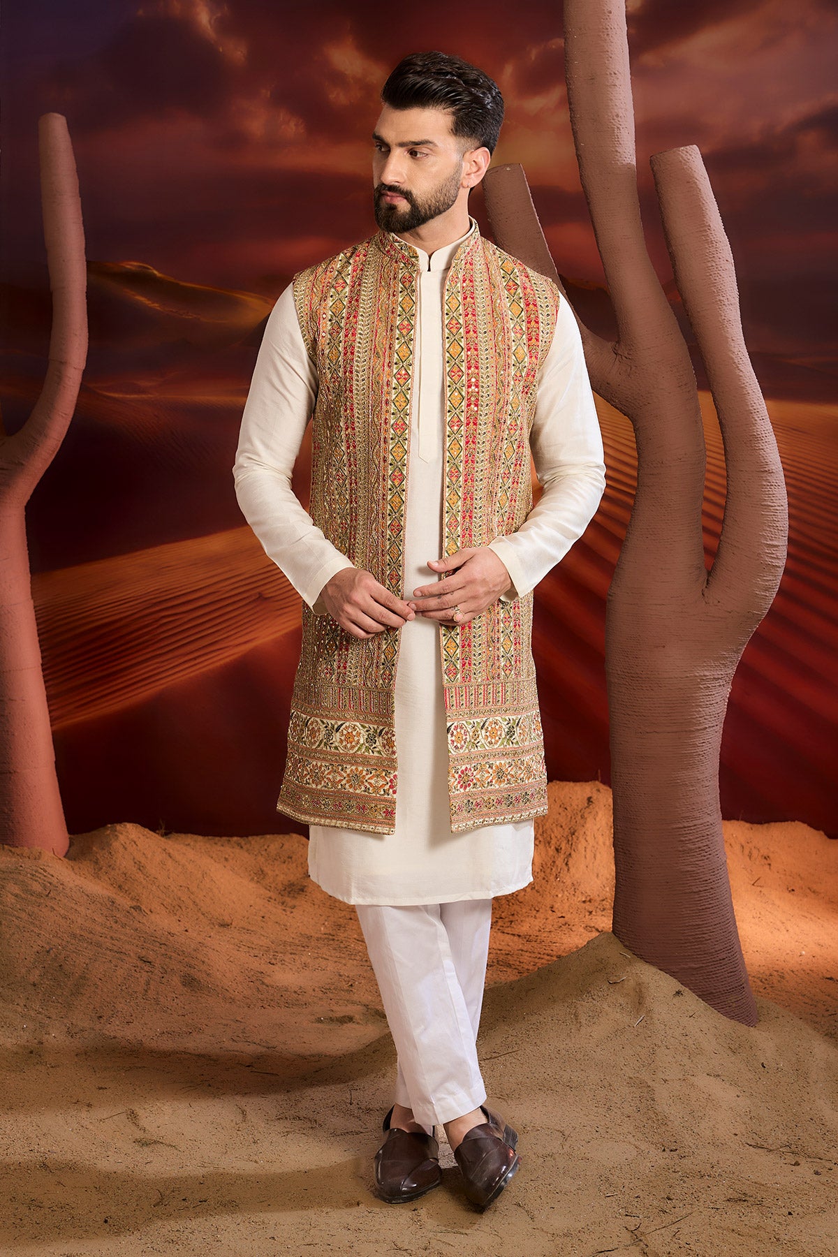 Regal Radiance Redefined With This Luxurious Zari Work Long Open Shrug