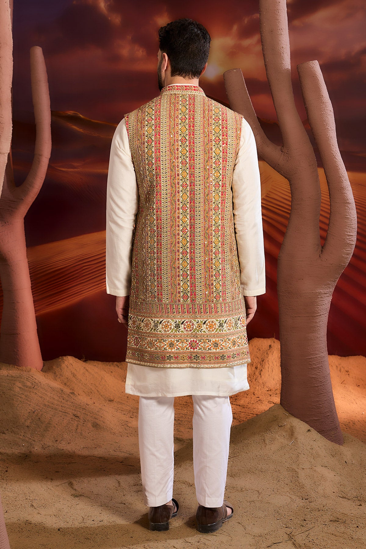 Regal Radiance Redefined With This Luxurious Zari Work Long Open Shrug