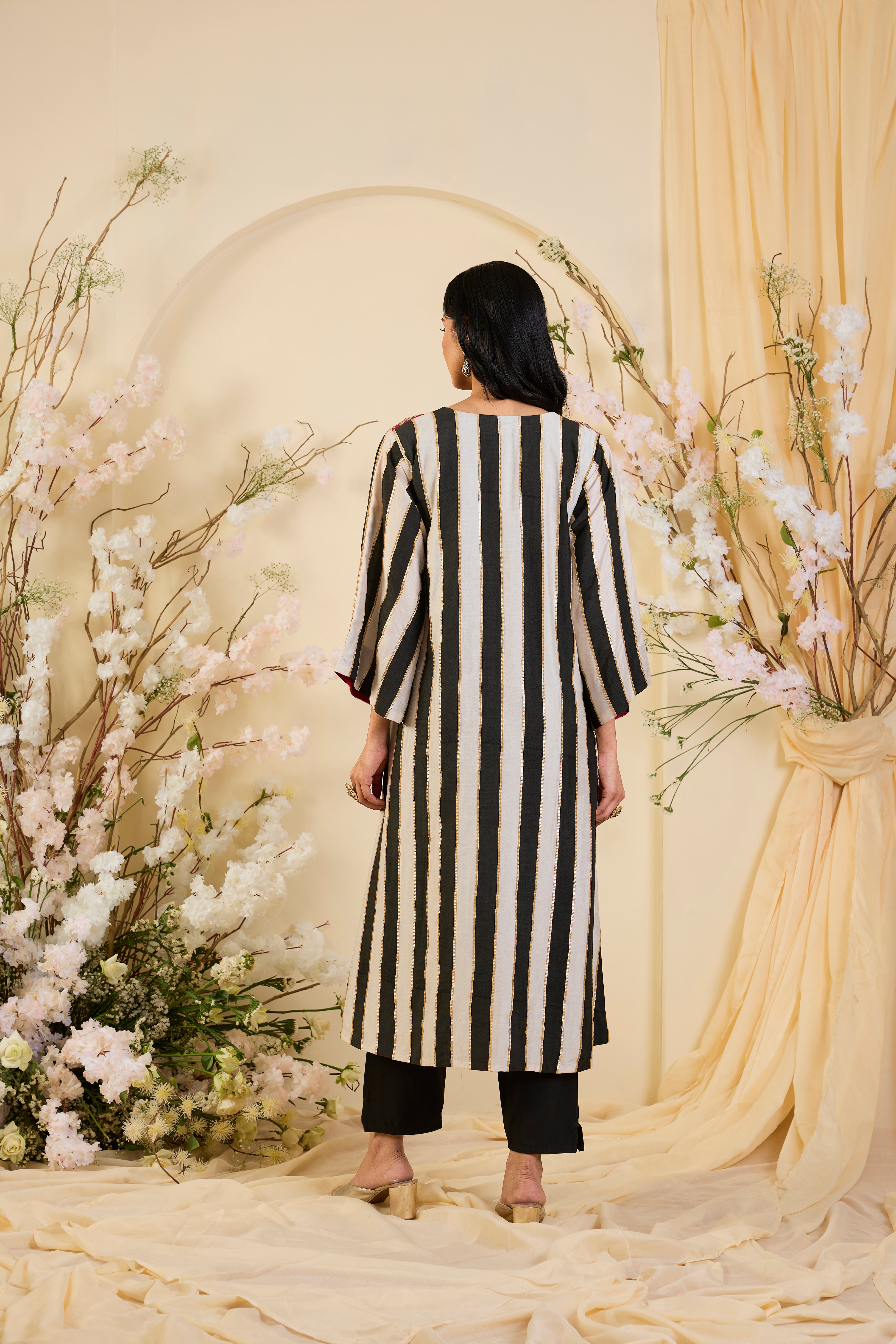 Noir Regalia: The Striped Symphony of Heritage & Opulence