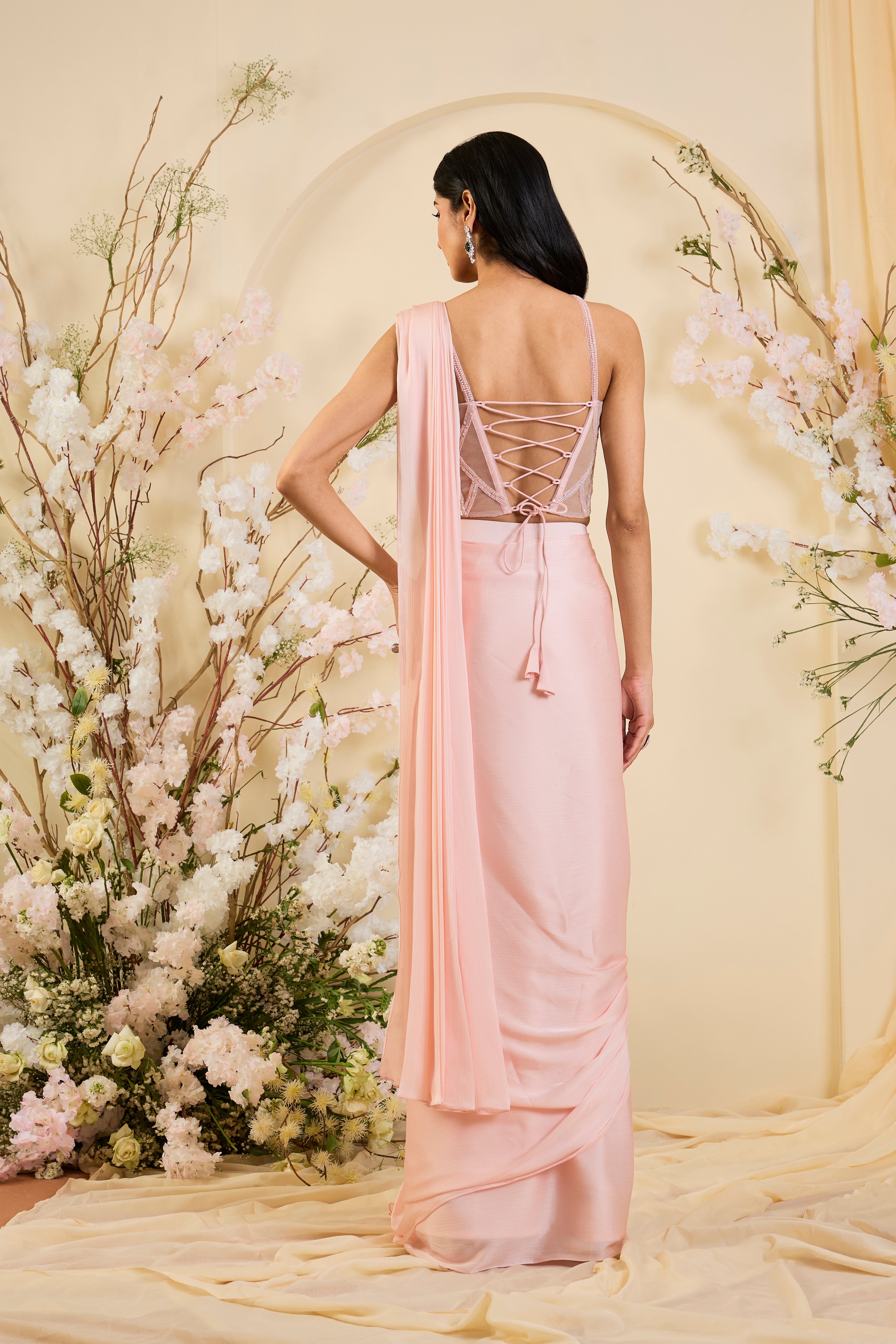 Blush Élan: Draped Saree Gown with Hand-Embellished Corset Bodice in Soft Rose Quartz Tones