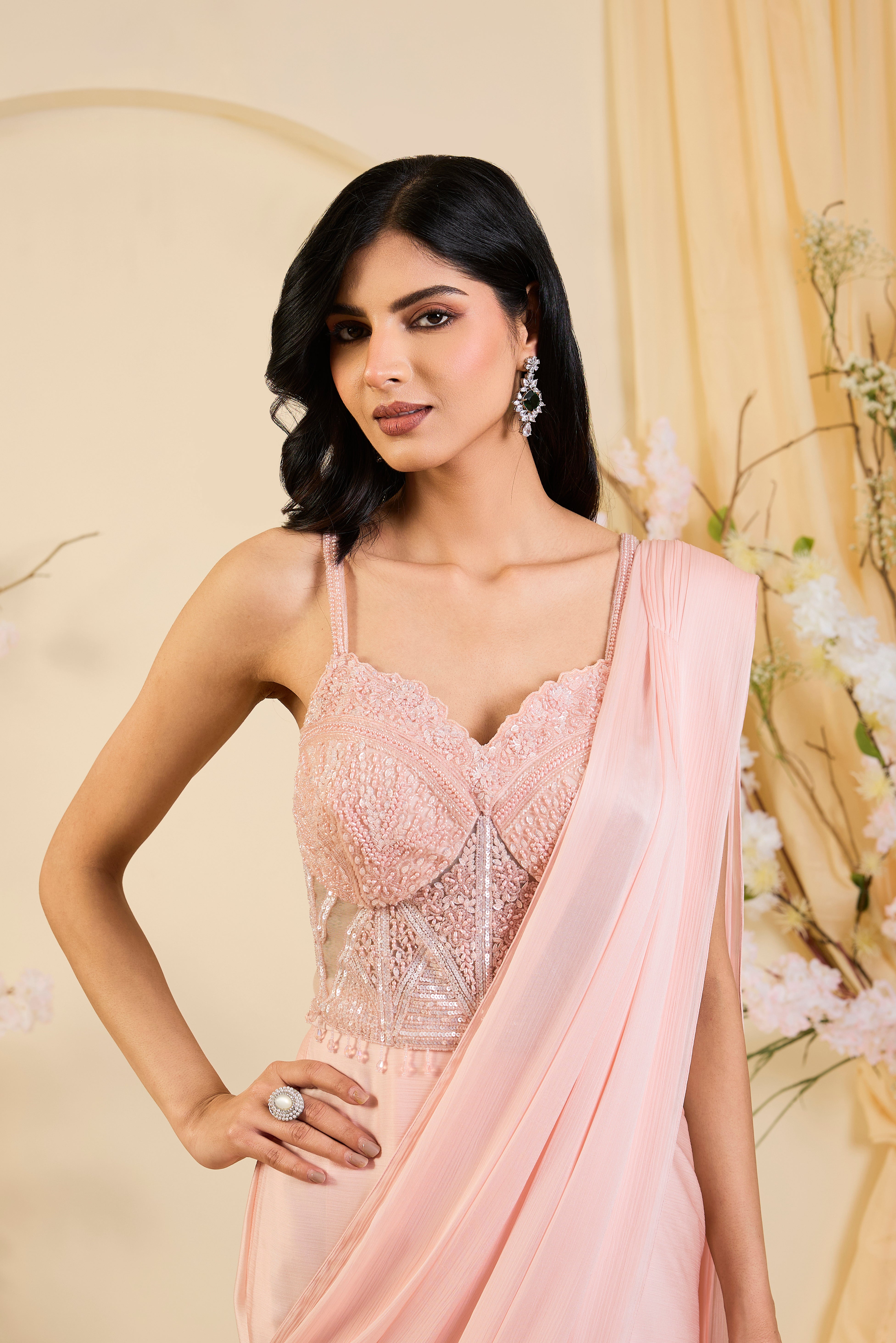 Blush Élan: Draped Saree Gown with Hand-Embellished Corset Bodice in Soft Rose Quartz Tones