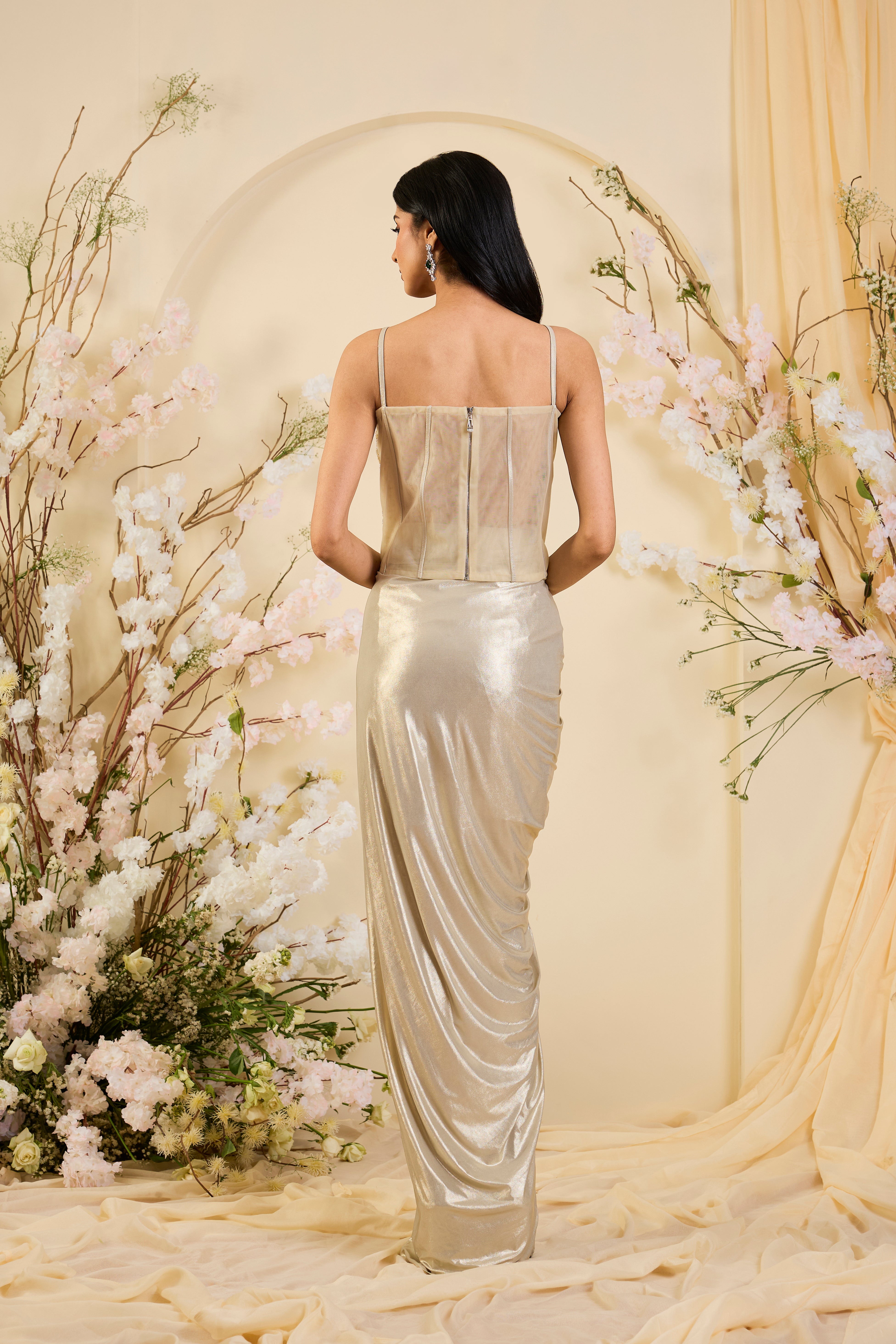 Champagne Drape Saree Gown with Hand-Embellished Corset Bodice & Sheer Cape Elegance