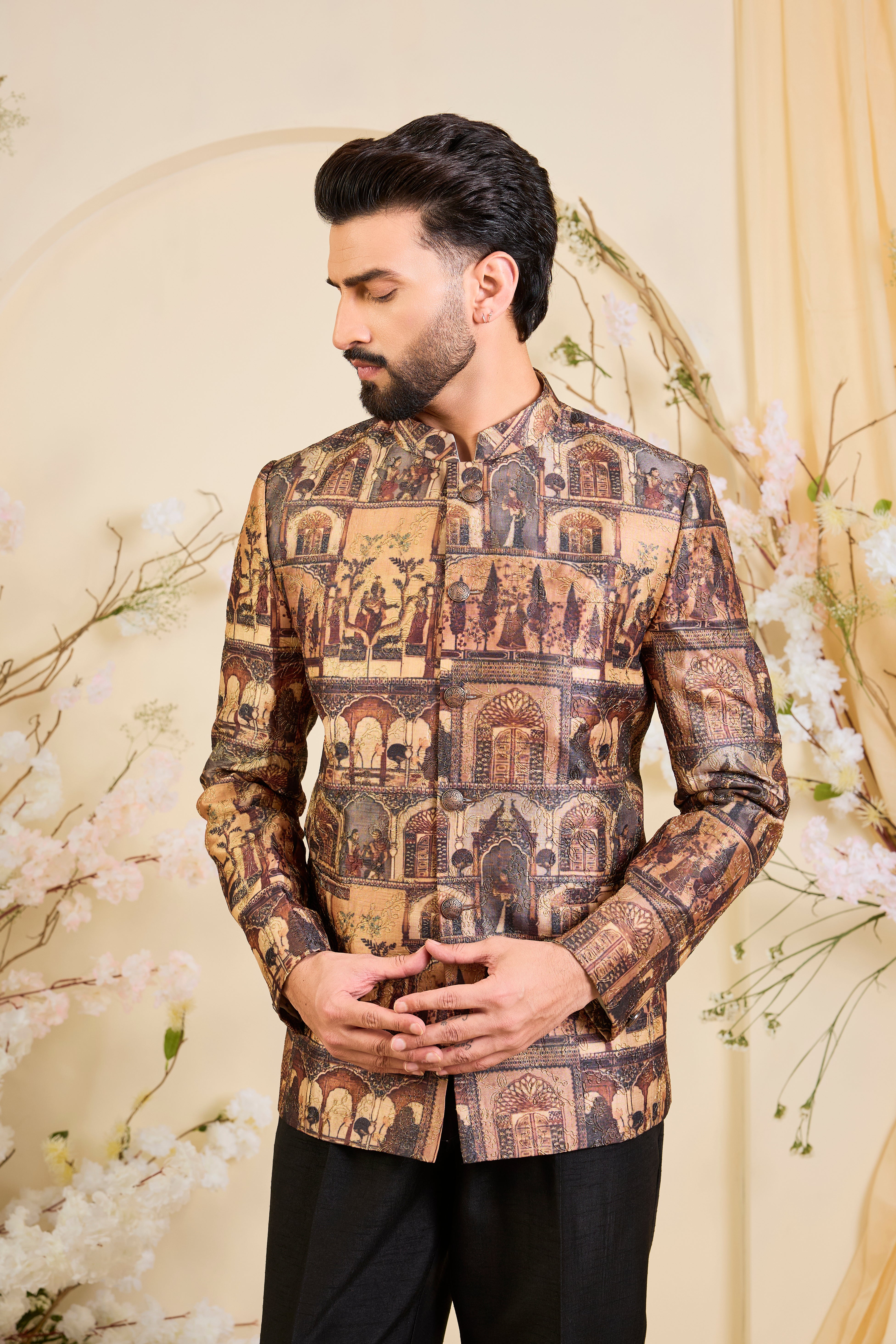 Rendered in a deep earthy brown, this bandgala unfolds like a living canvas of Mughal grandeur, adorned with intricately illustrated royal figures and courtly scenes.