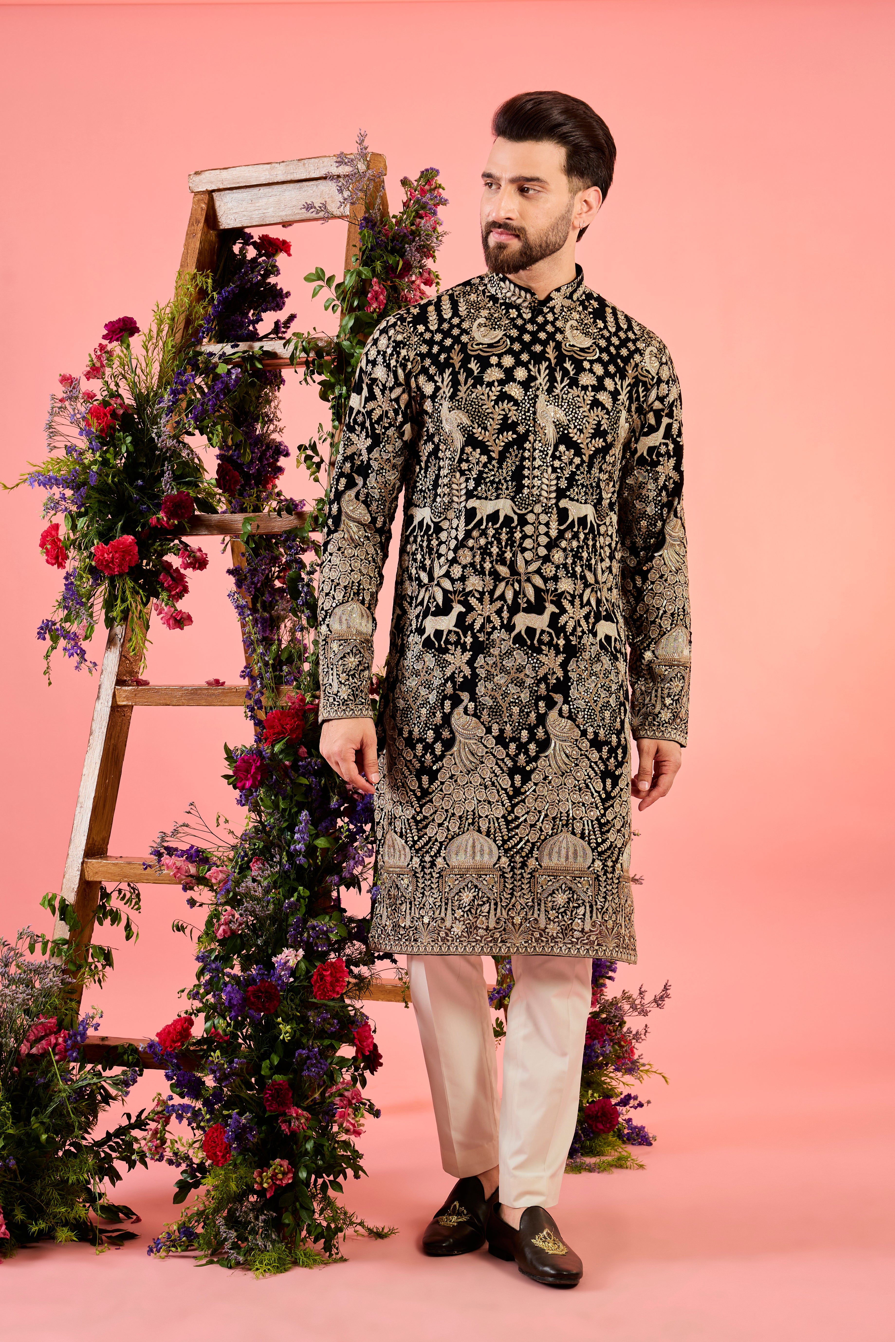 The royal heritage - midnight black kurta with sequin - flora and fauna figures