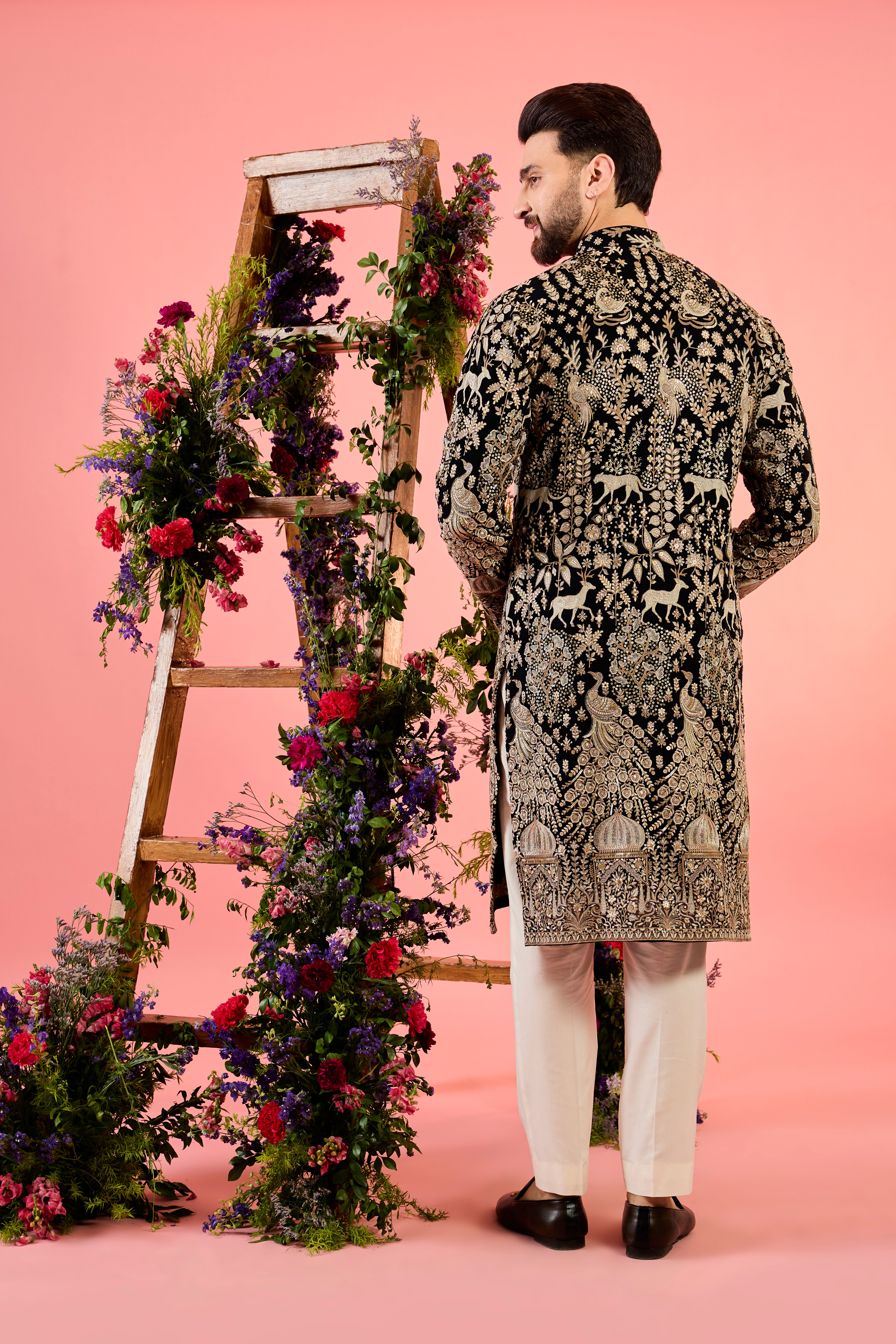 The royal heritage - midnight black kurta with sequin - flora and fauna figures
