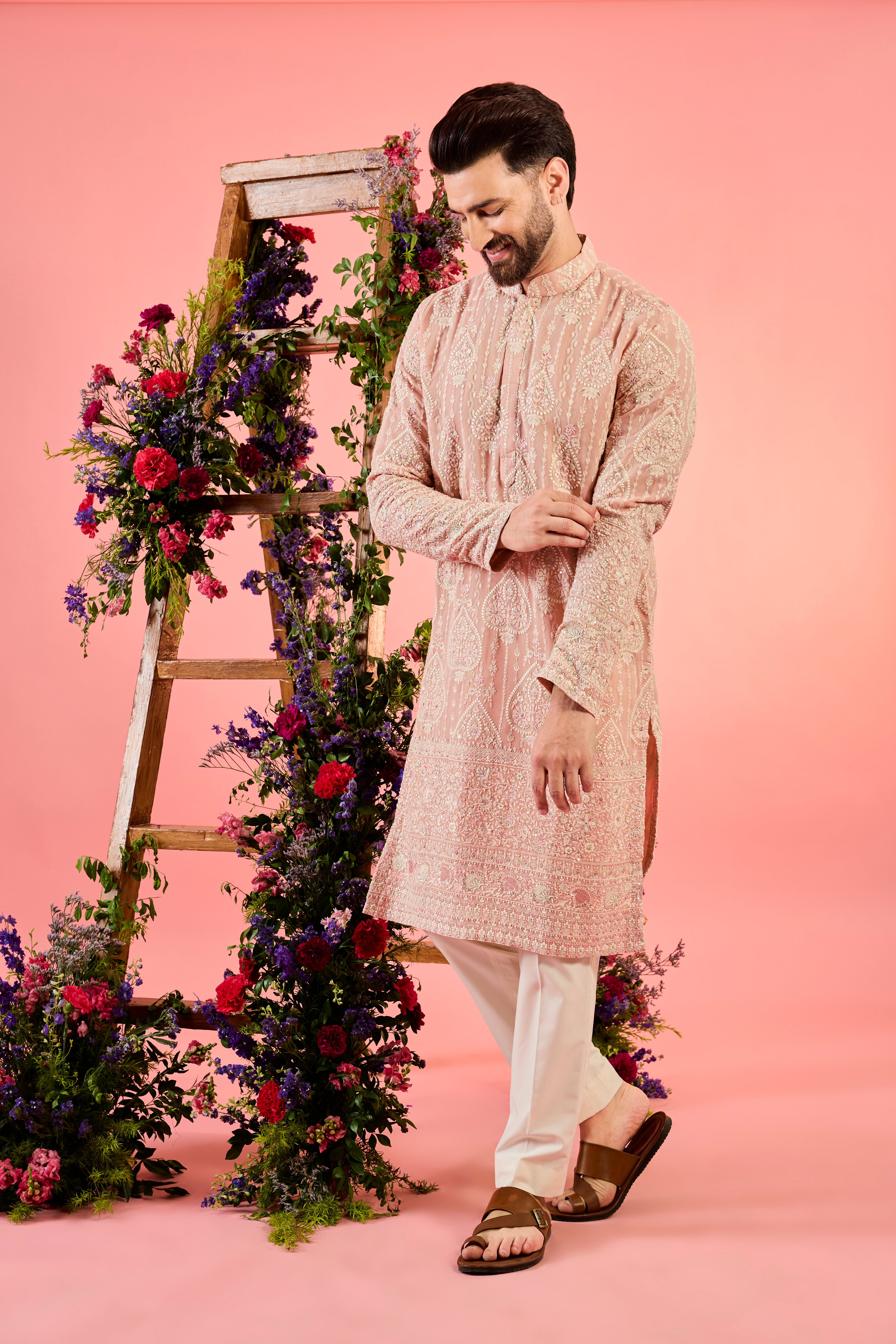 This pink chikankari kurta showcases exquisite embroidery, blending tradition with elegance