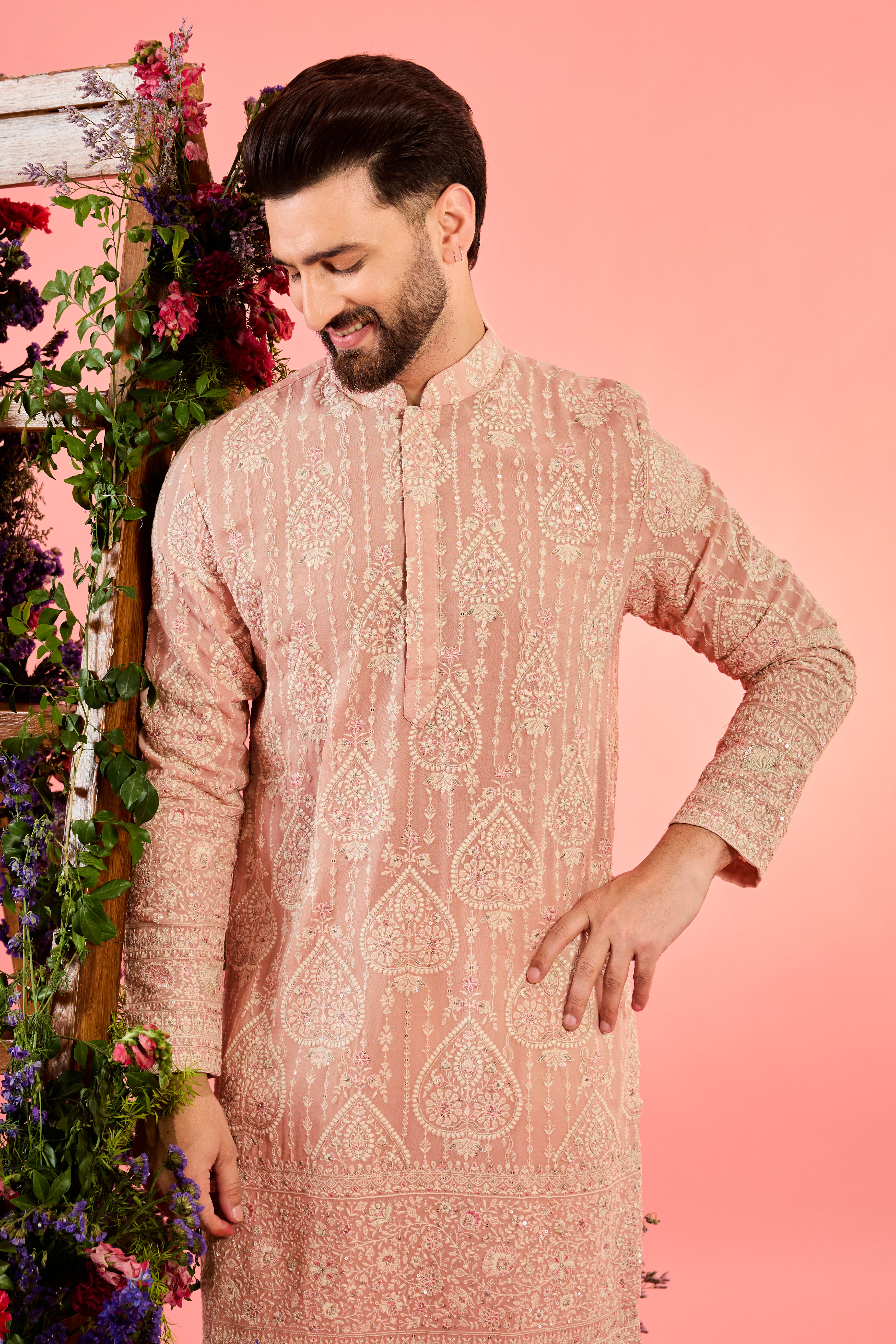 This pink chikankari kurta showcases exquisite embroidery, blending tradition with elegance