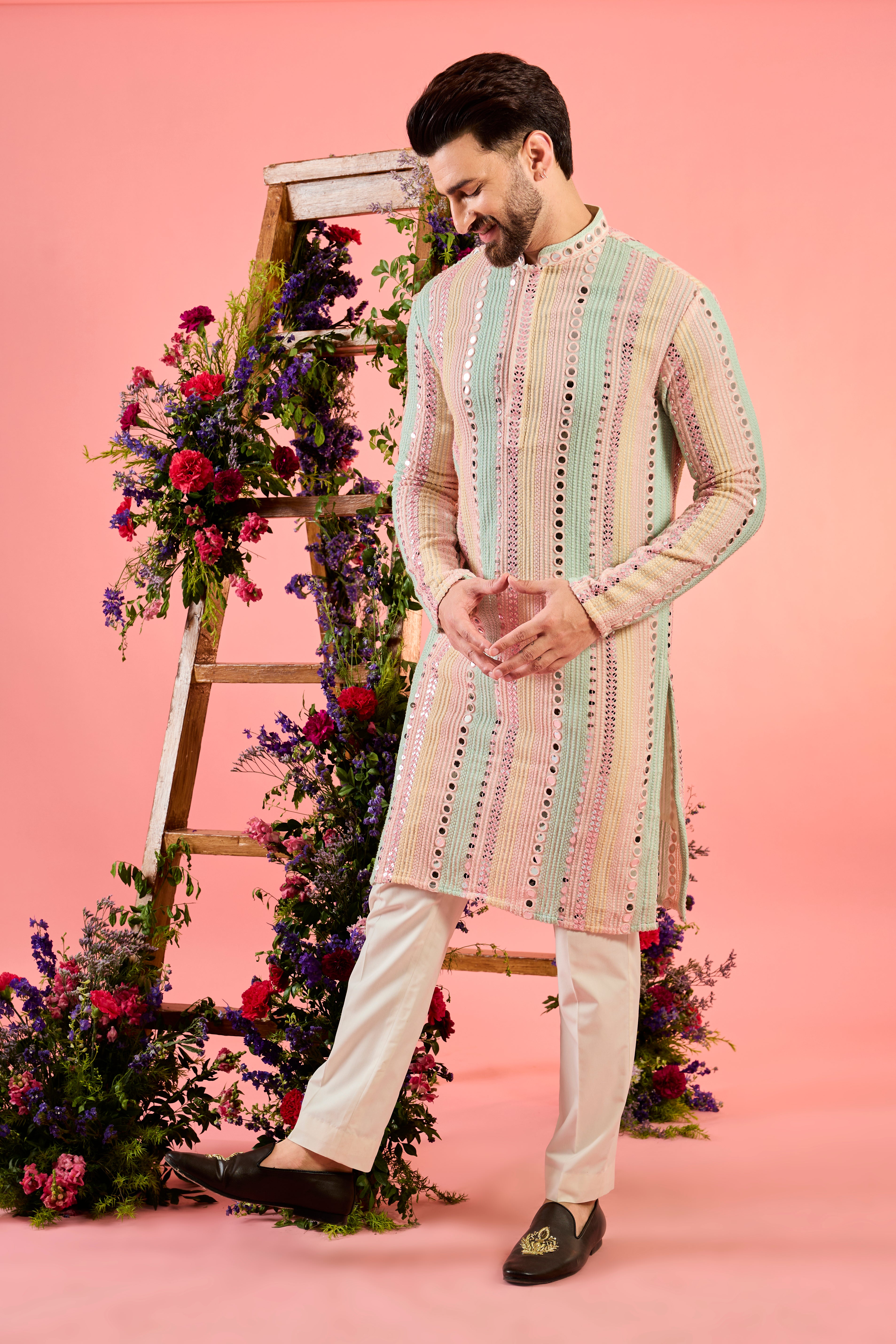 signature multi coloured mirror work kurta with intricate thread work