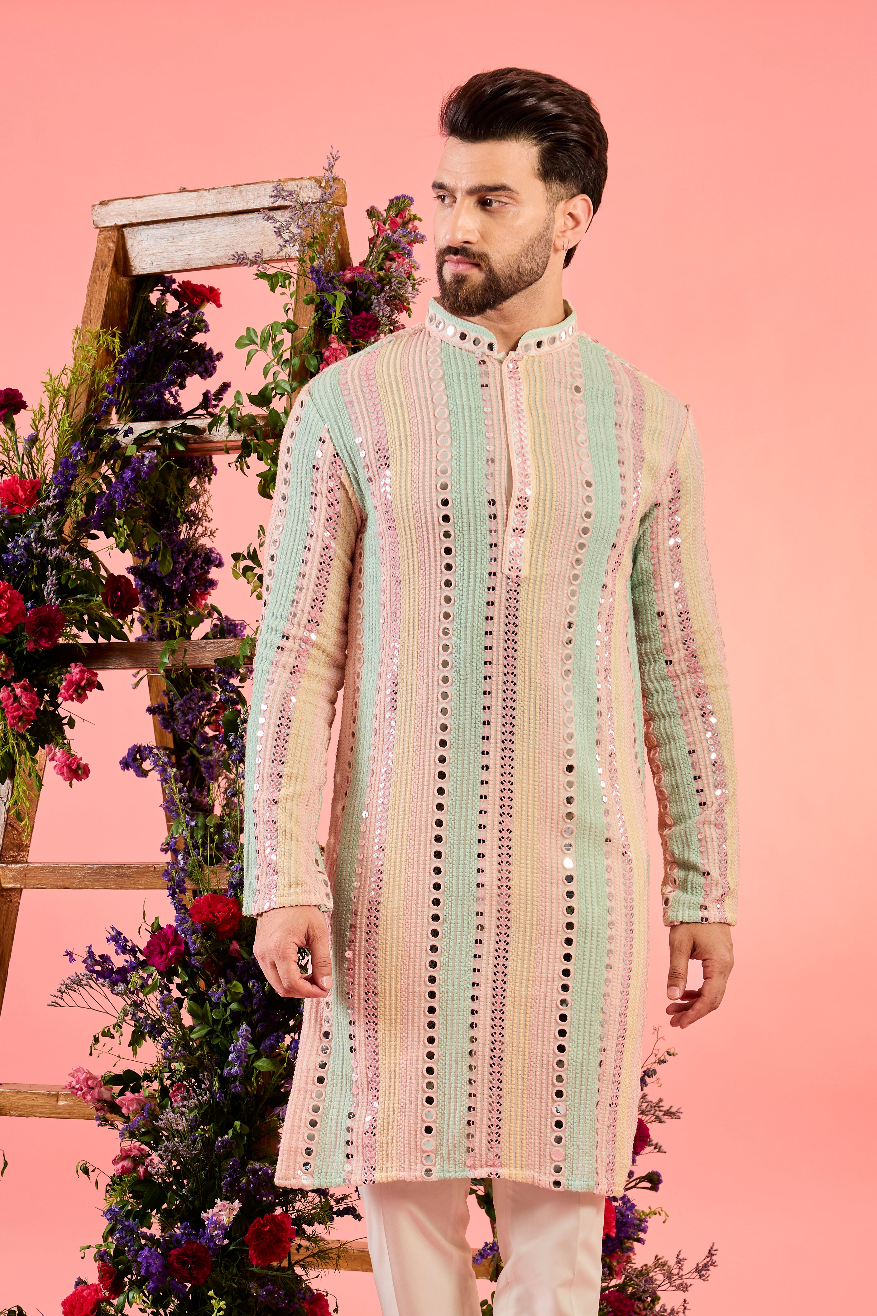 signature multi coloured mirror work kurta with intricate thread work