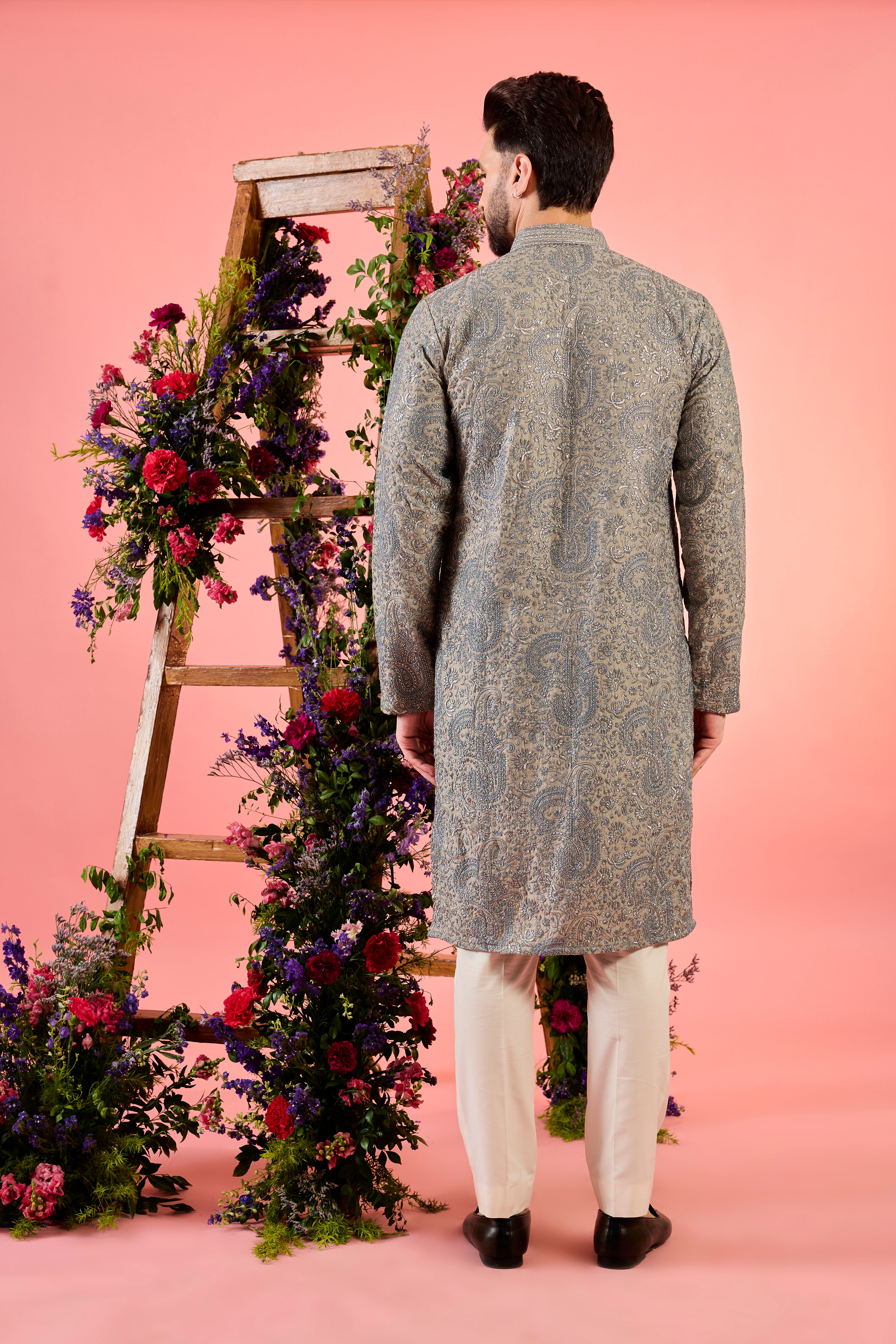 beige chikankari kurta with deialed paisley embroidery and zari work