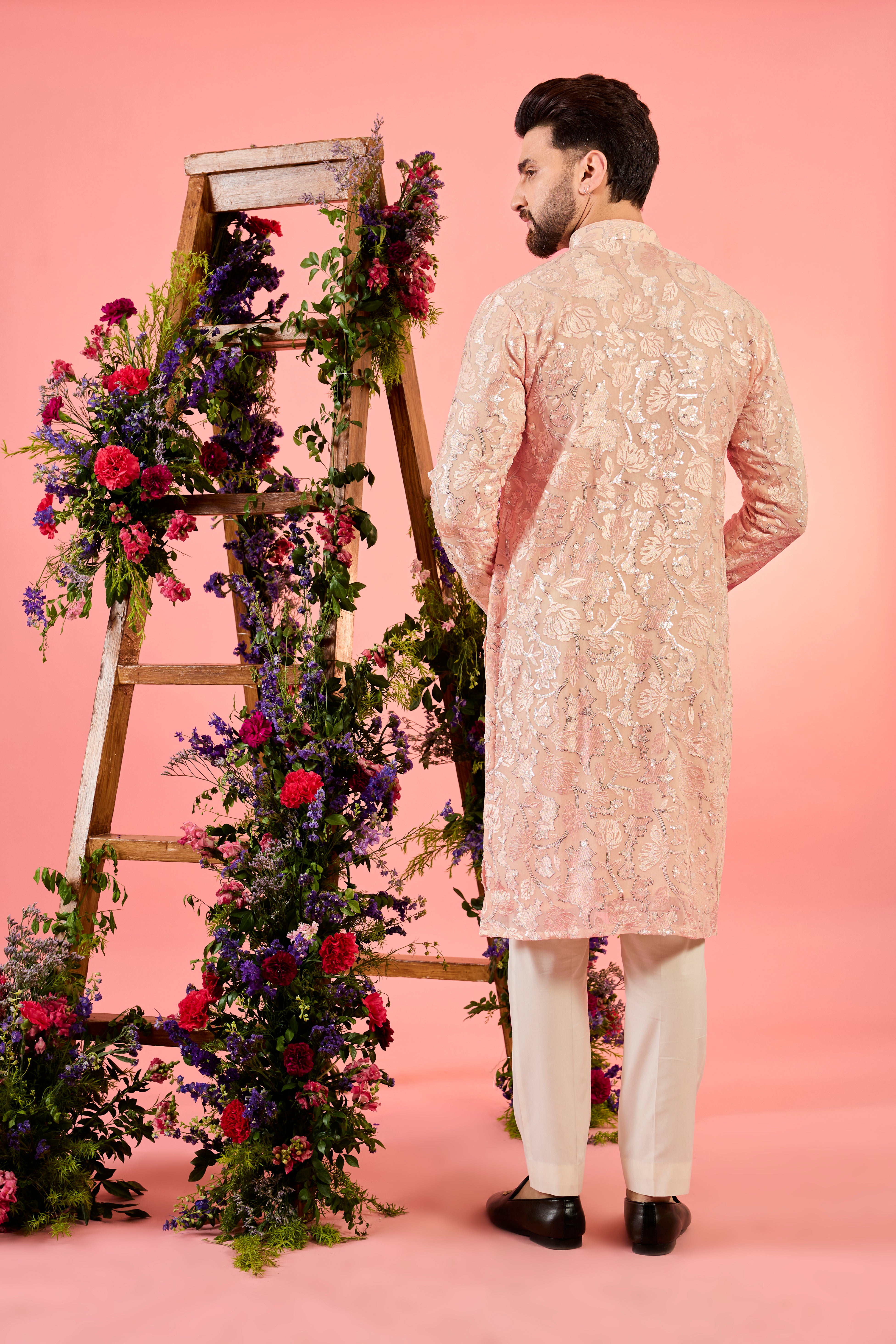 peach chinkari kurta with intricate floral embroidery