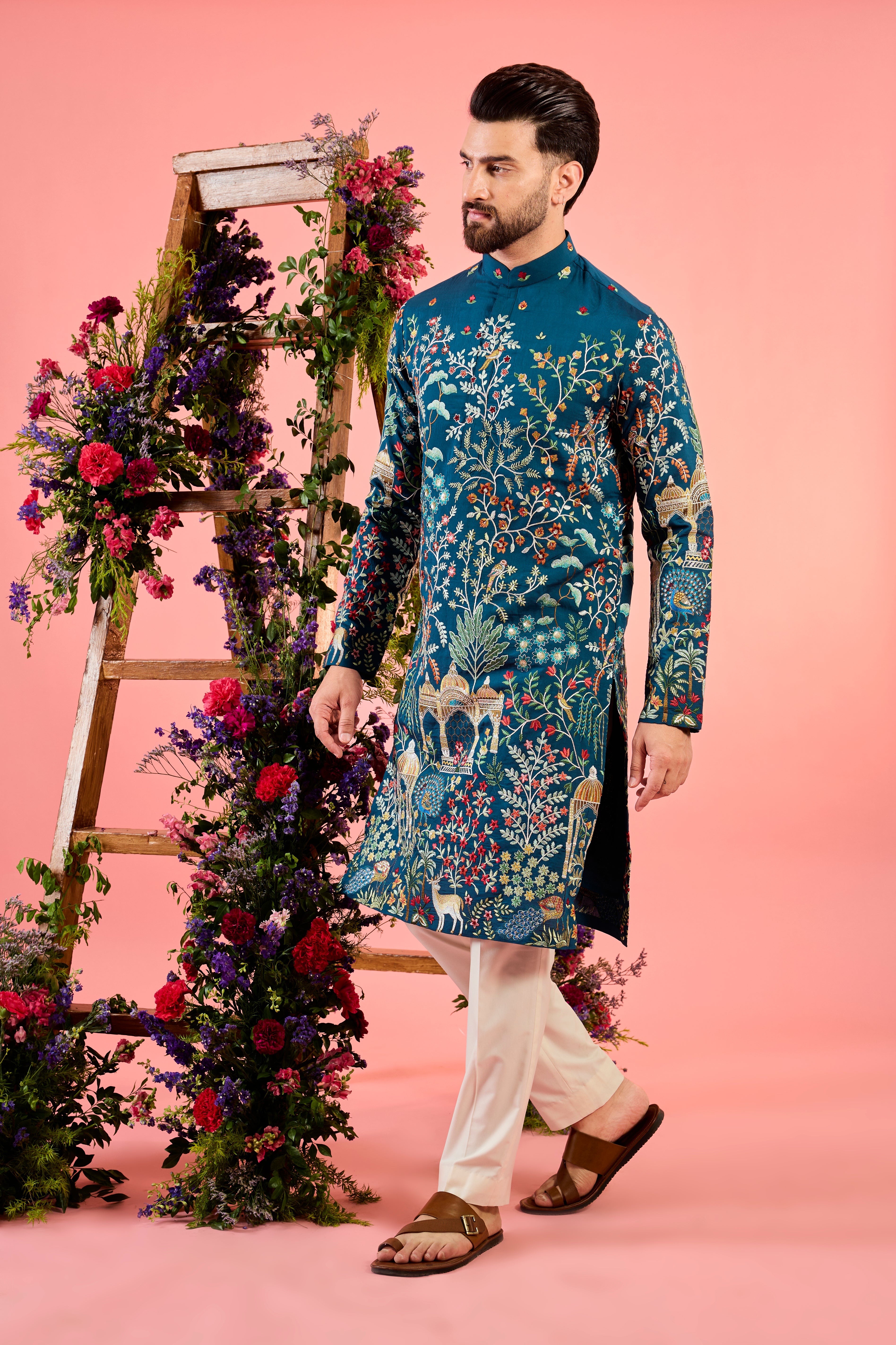 blue chikankari kurta with intricate flora and fauna embroidery