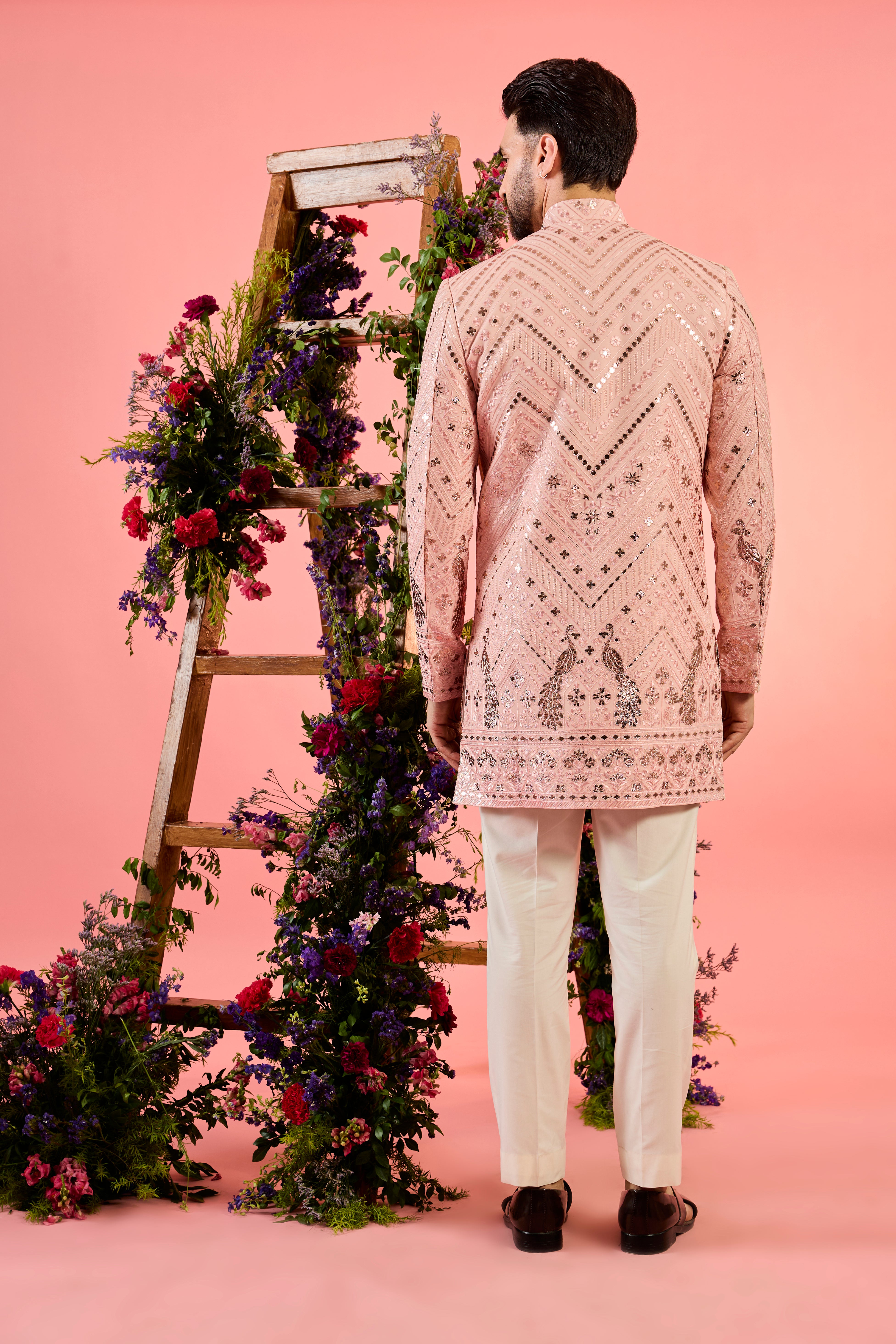 peach leather patchwork short indowestern with detailed flora and fauna figures