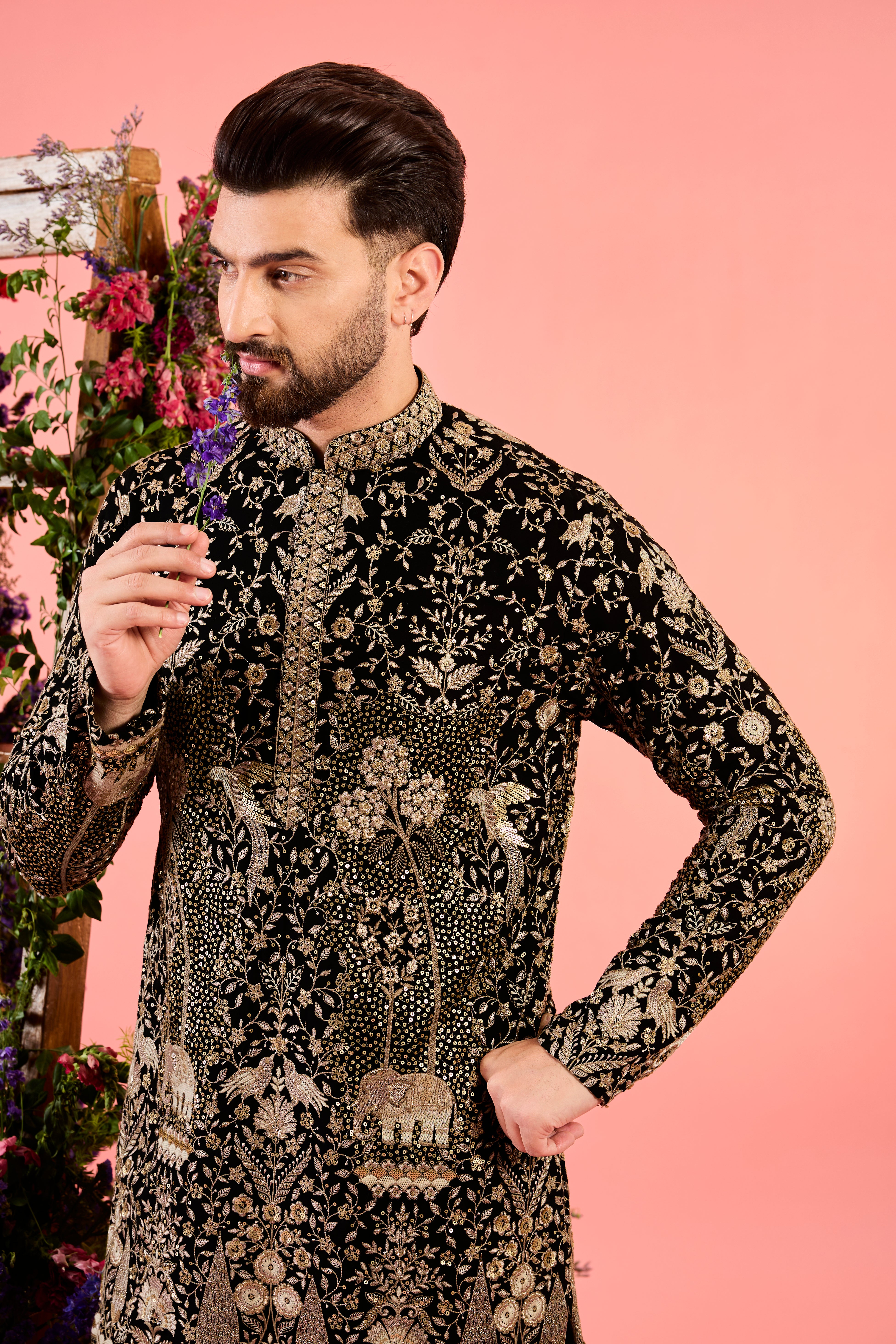 black sequined kurta with intricate flora and fauna embroidery
