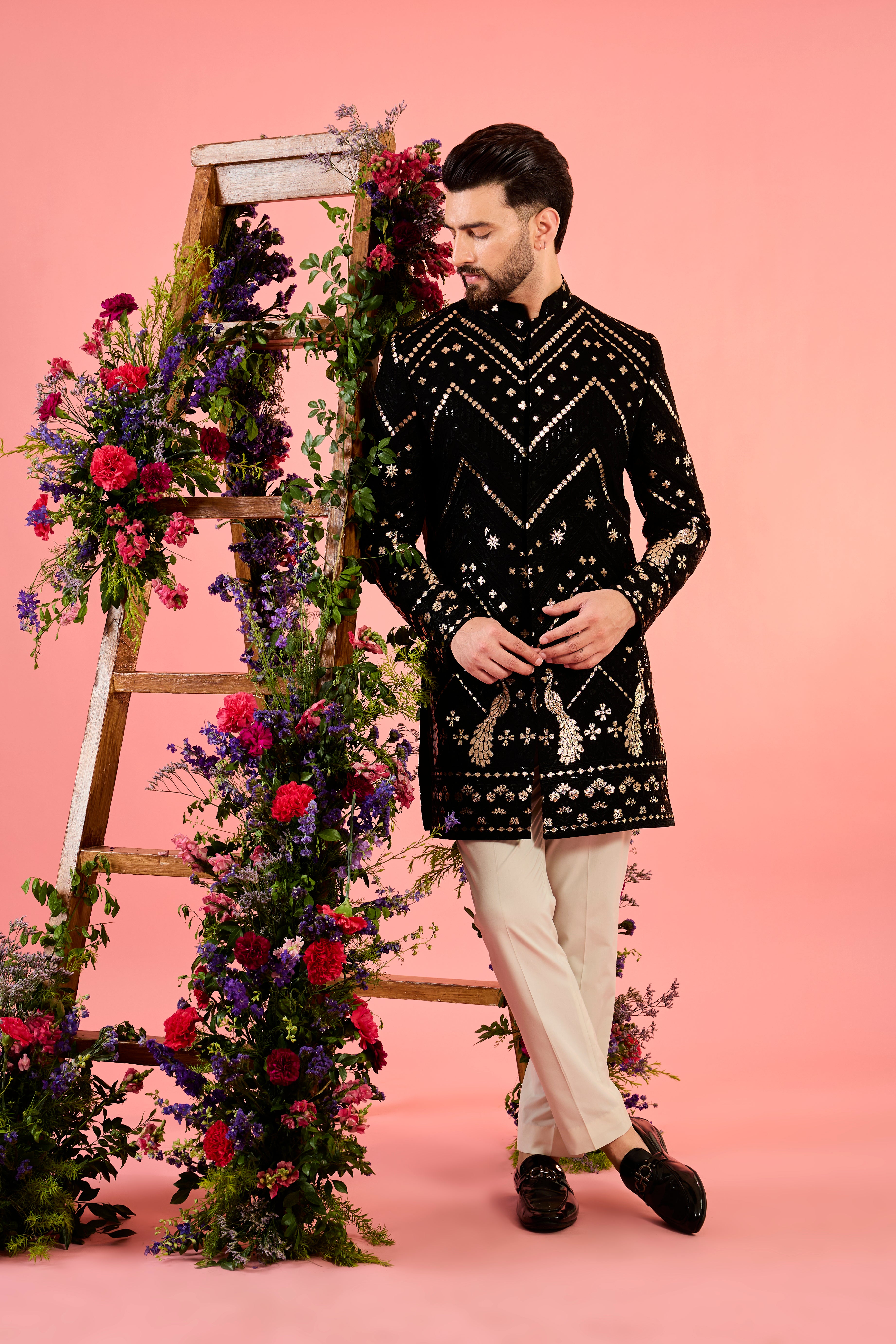 black leather patchwork short indowestern with detailed flora and fauna figures