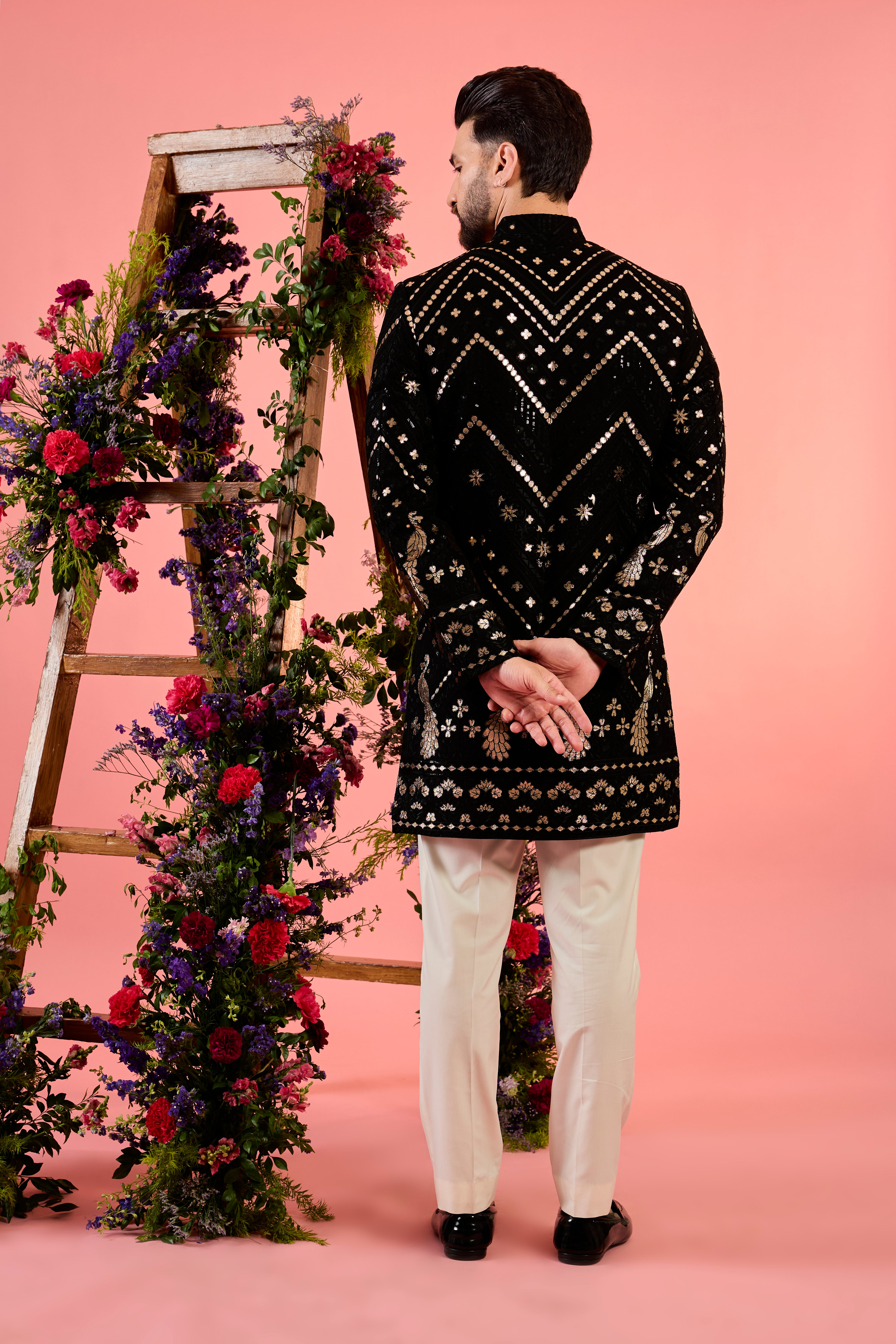 black leather patchwork short indowestern with detailed flora and fauna figures