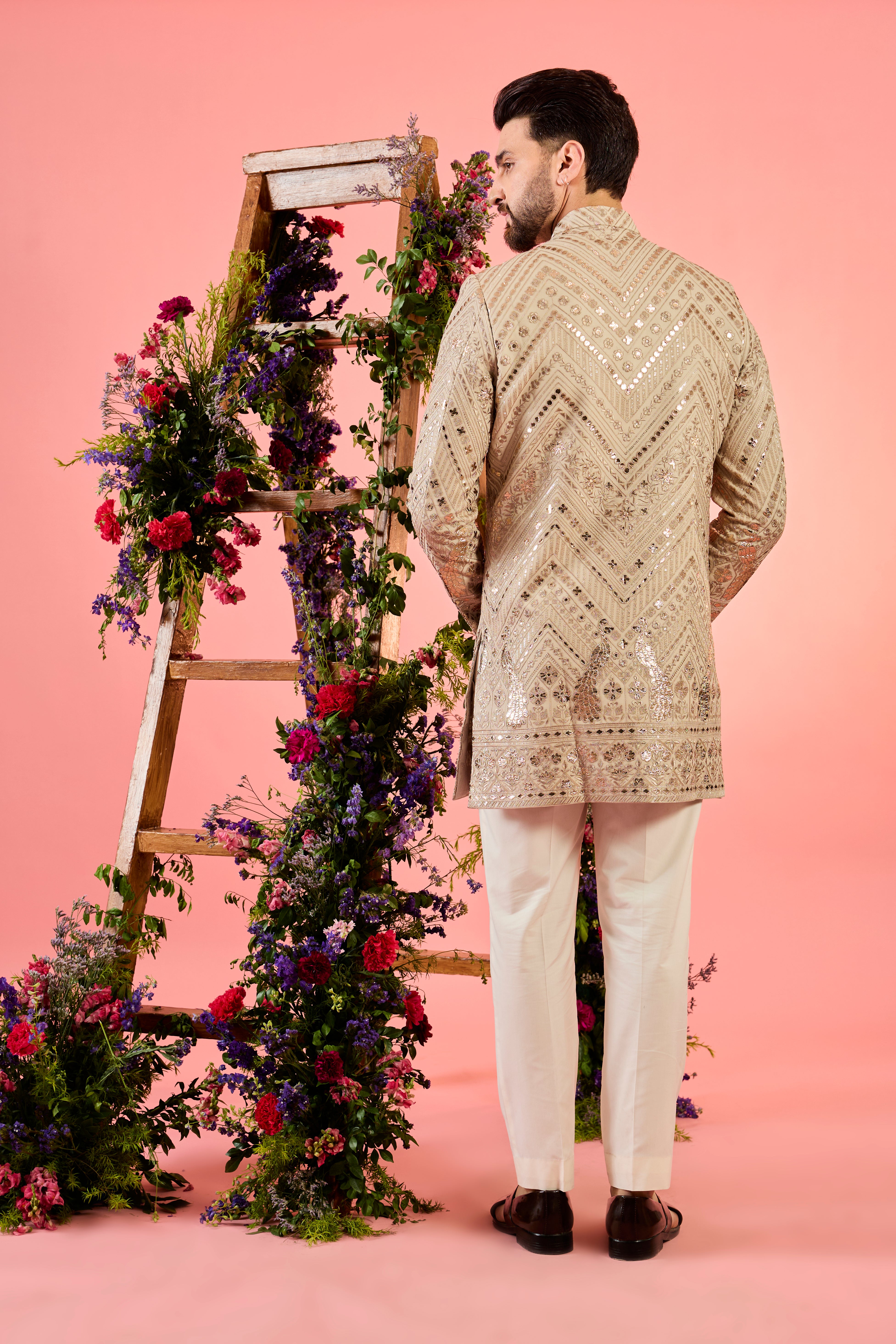 beige leather patchwork short indowestern with detailed flora and fauna figures