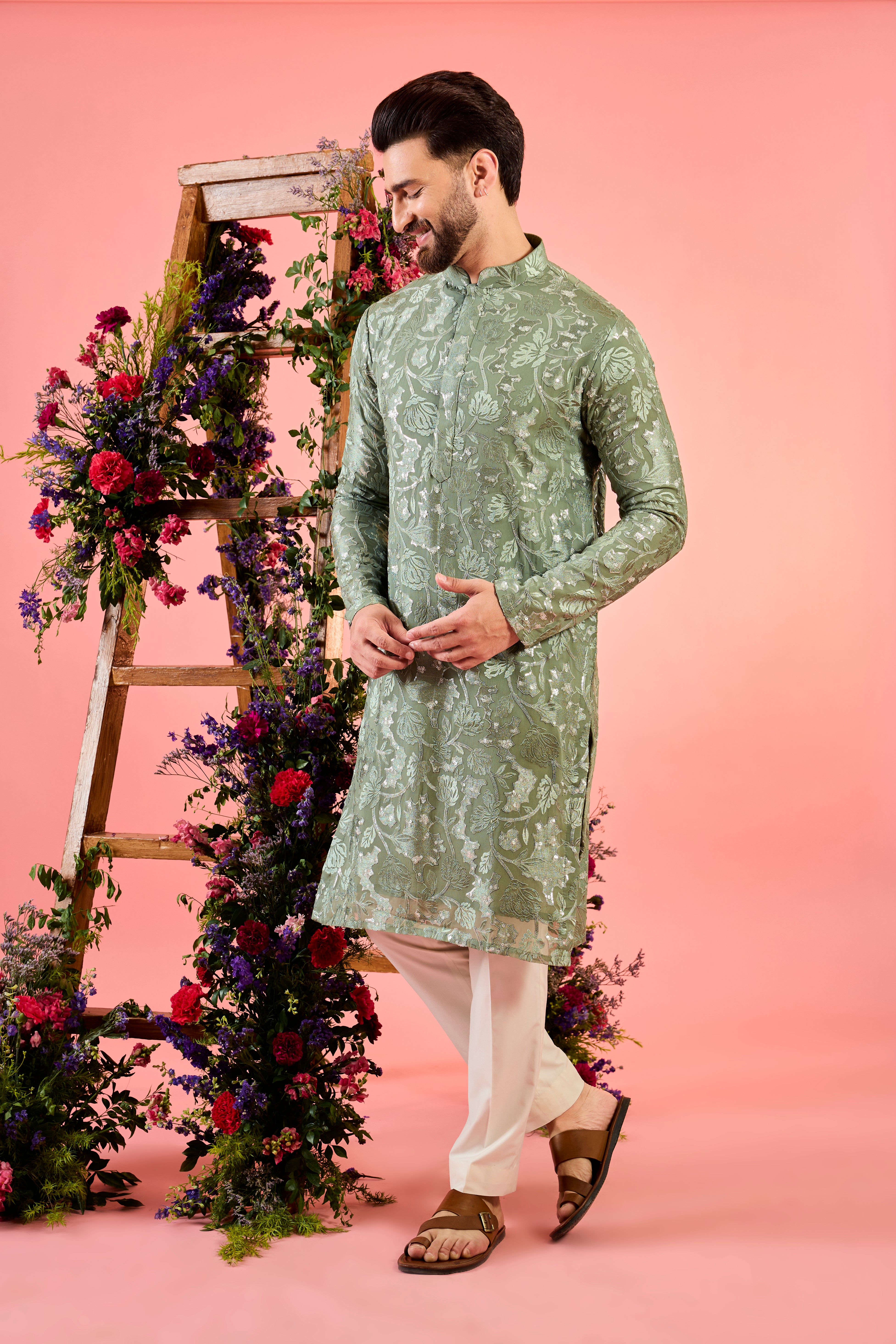 sage green chikankari kurta with intricate floral embroidery