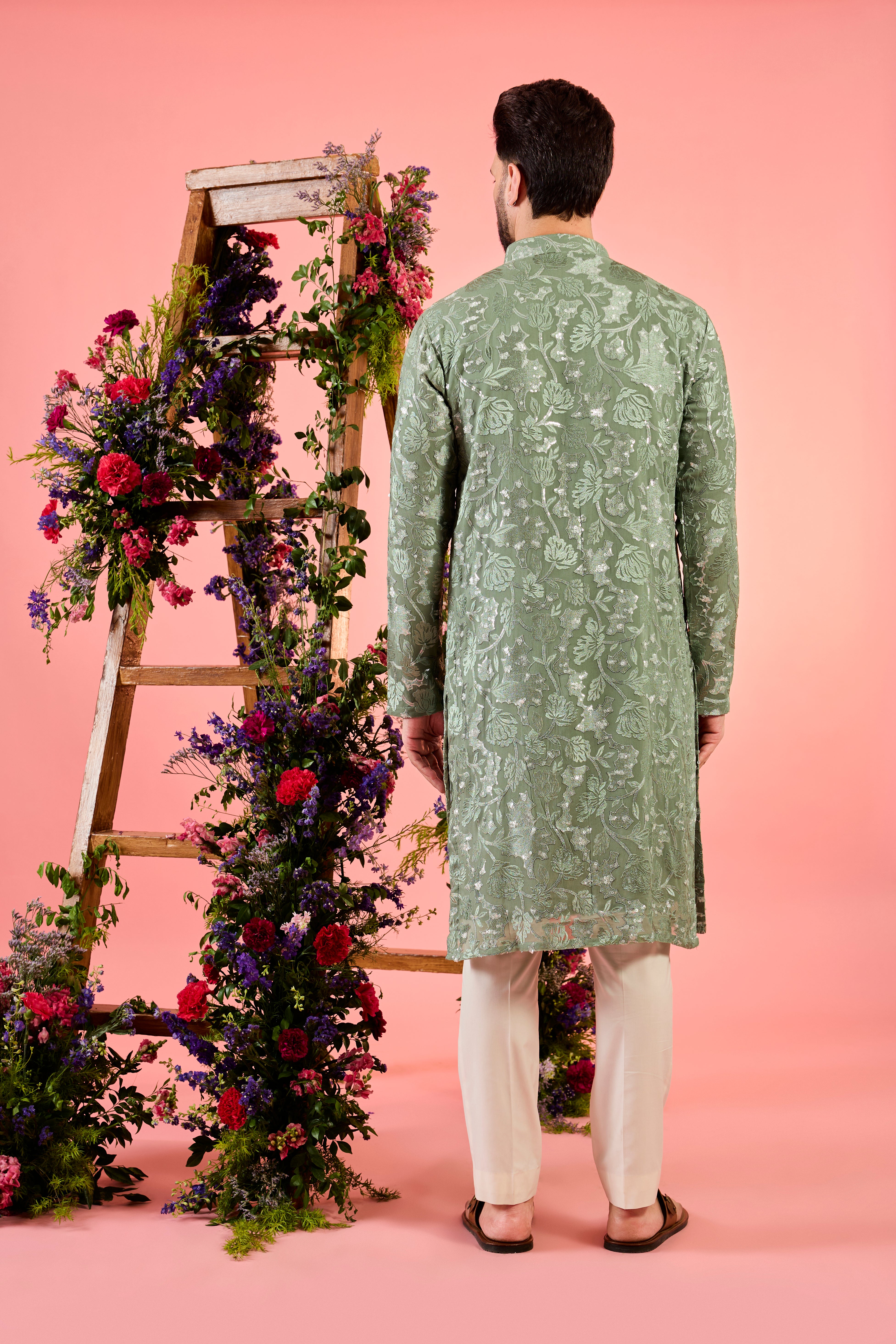 sage green chikankari kurta with intricate floral embroidery