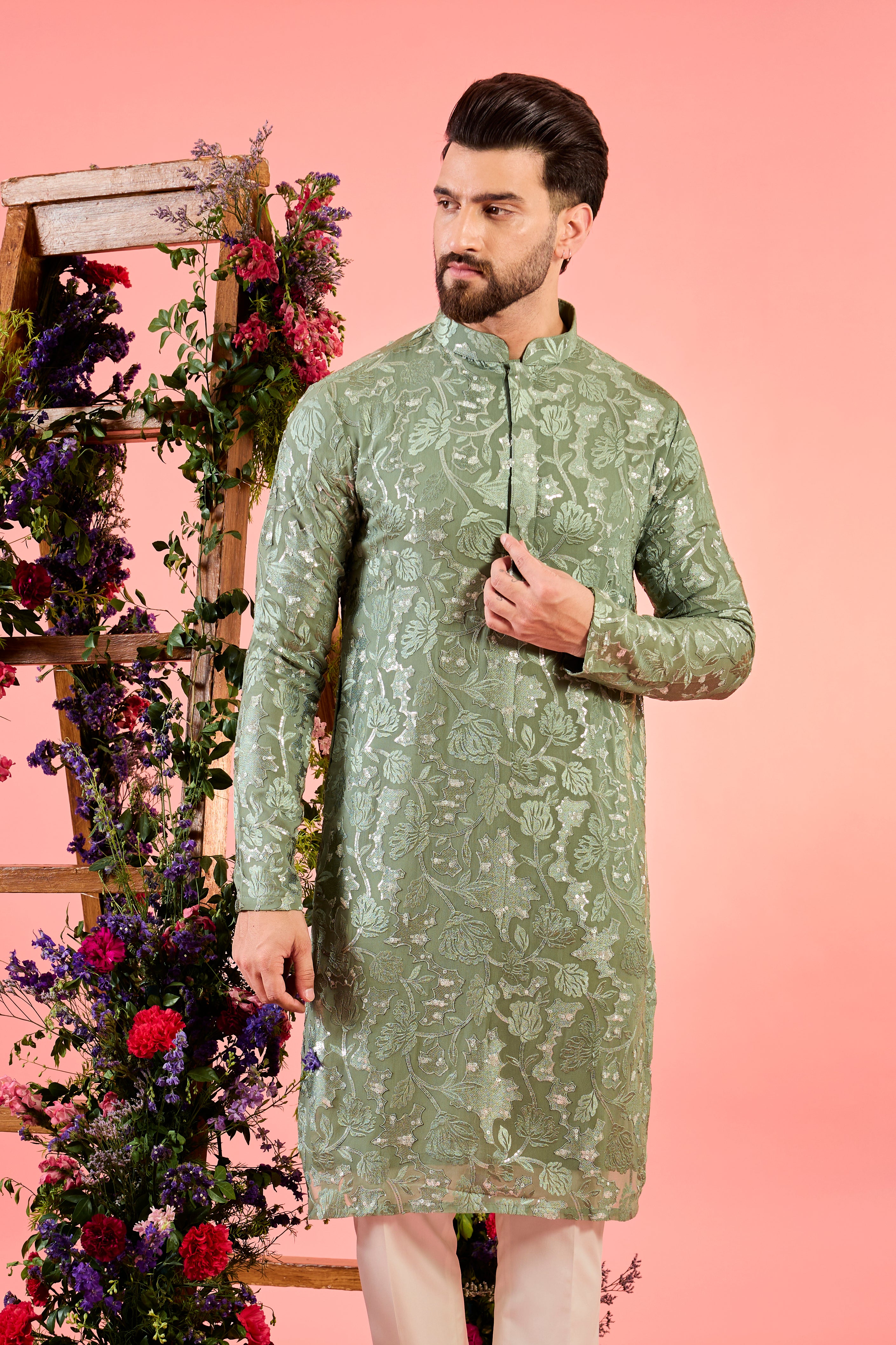 sage green chikankari kurta with intricate floral embroidery