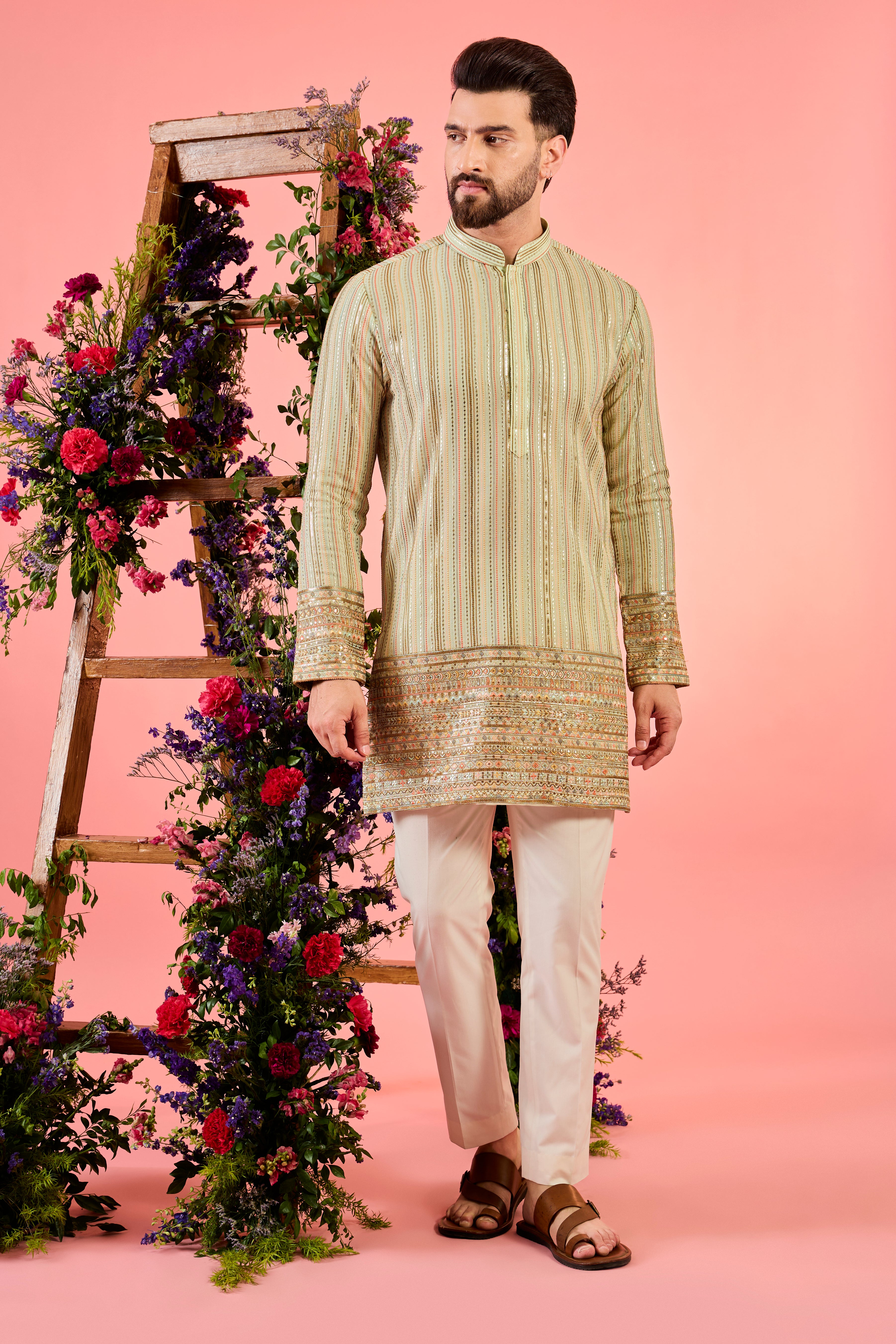 This short kurta is a masterpiece in minimalism, showcasing delicate thread embroidery that exudes sophistication and modern refinement