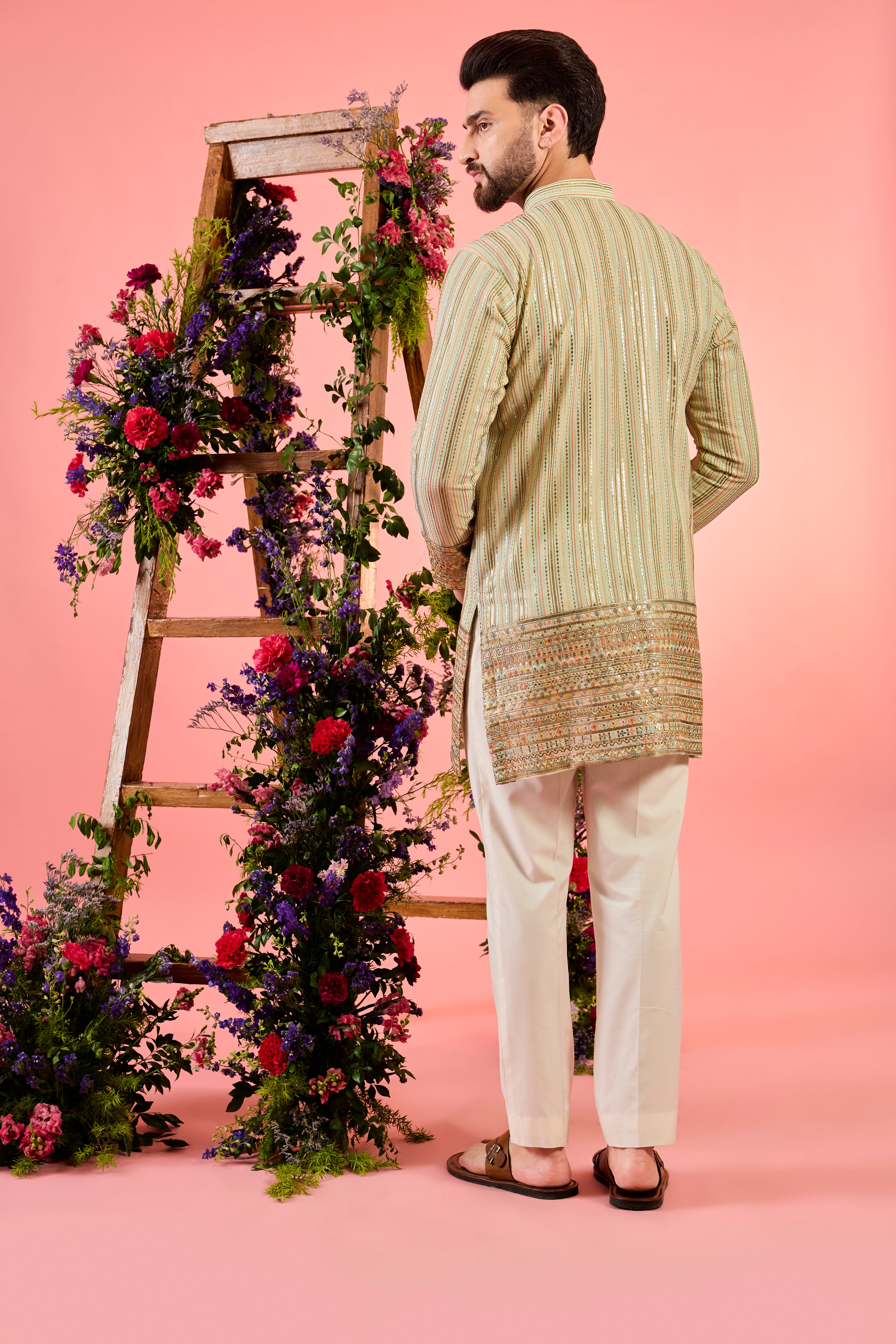 This short kurta is a masterpiece in minimalism, showcasing delicate thread embroidery that exudes sophistication and modern refinement