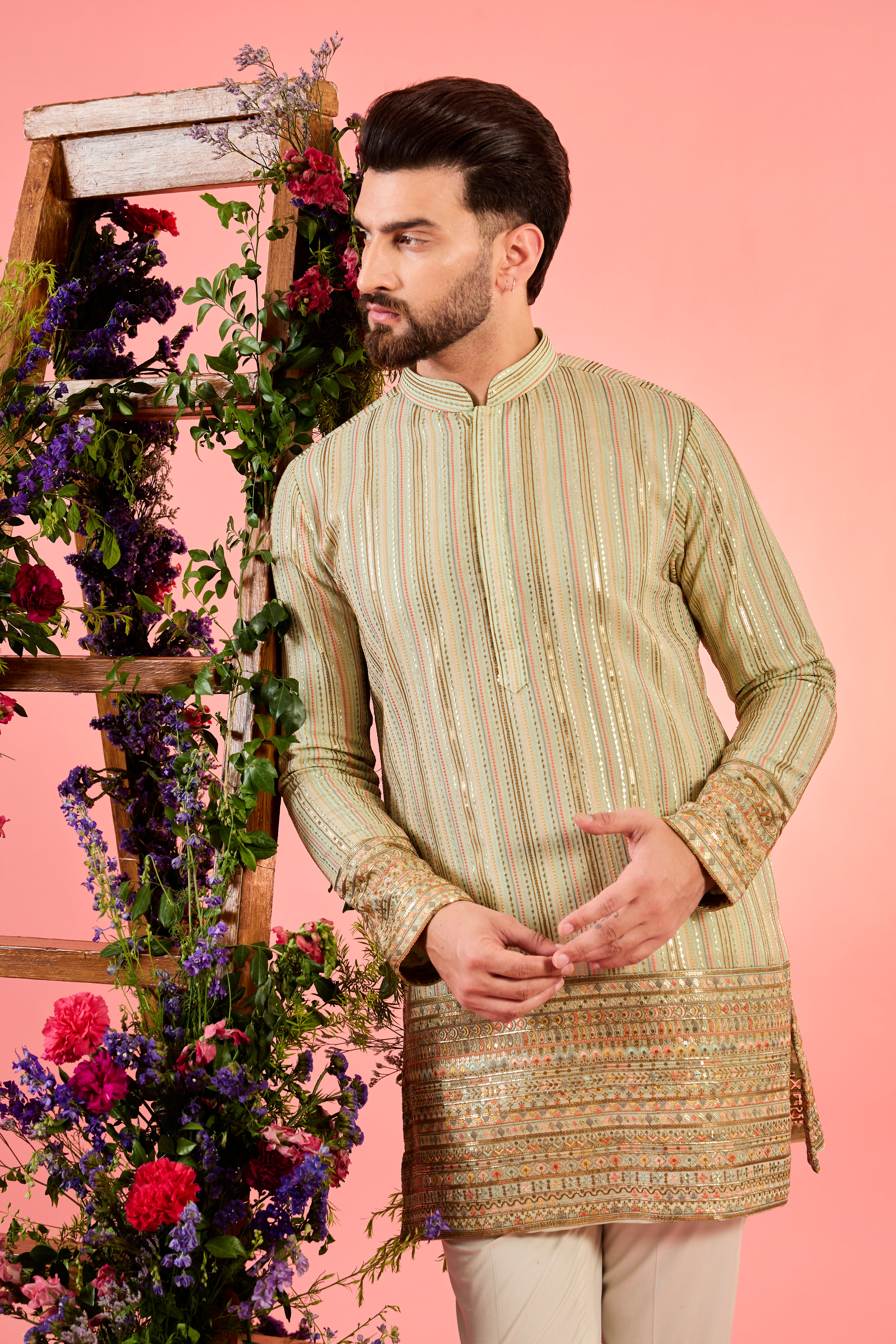 This short kurta is a masterpiece in minimalism, showcasing delicate thread embroidery that exudes sophistication and modern refinement