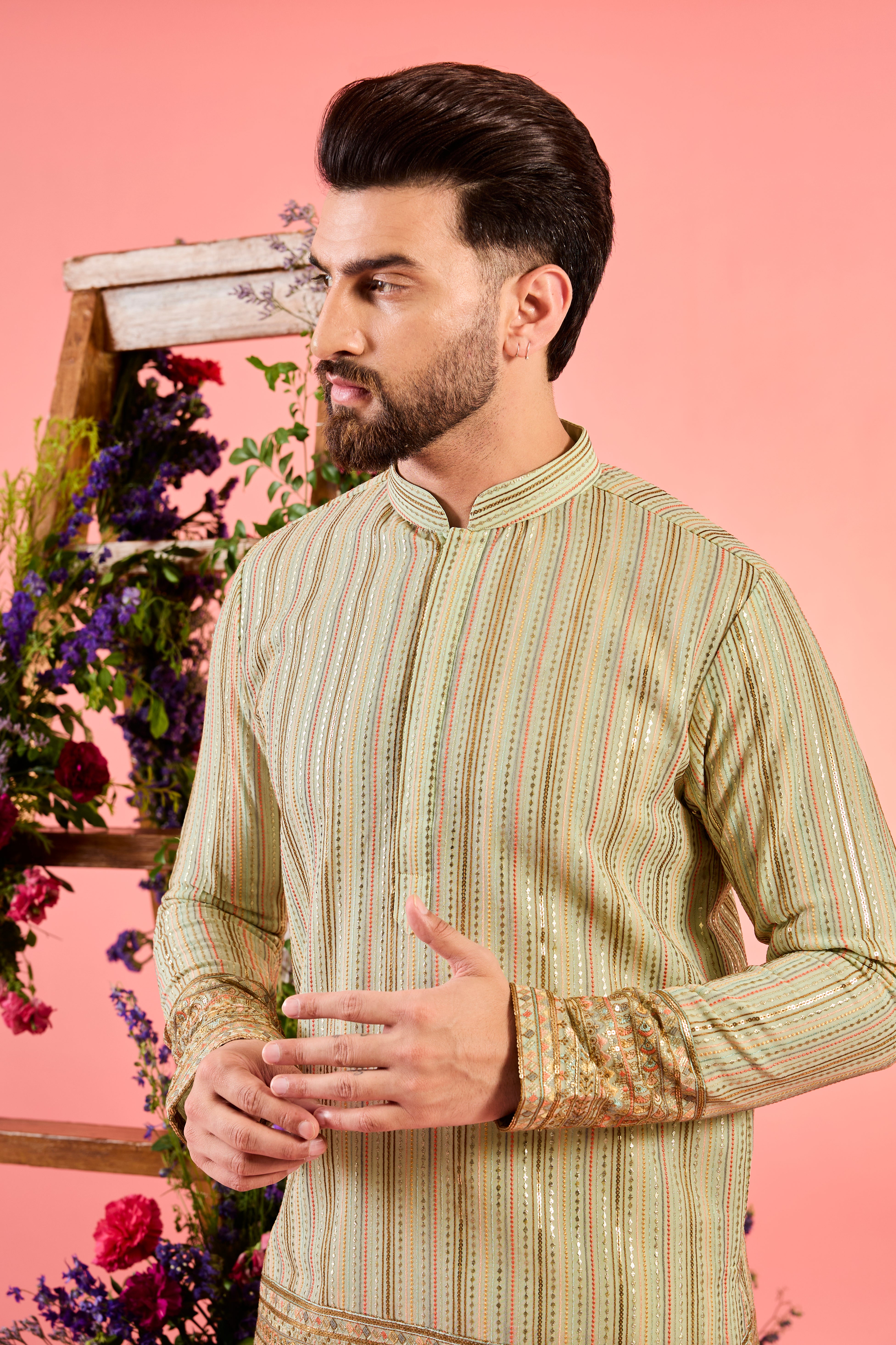 This short kurta is a masterpiece in minimalism, showcasing delicate thread embroidery that exudes sophistication and modern refinement