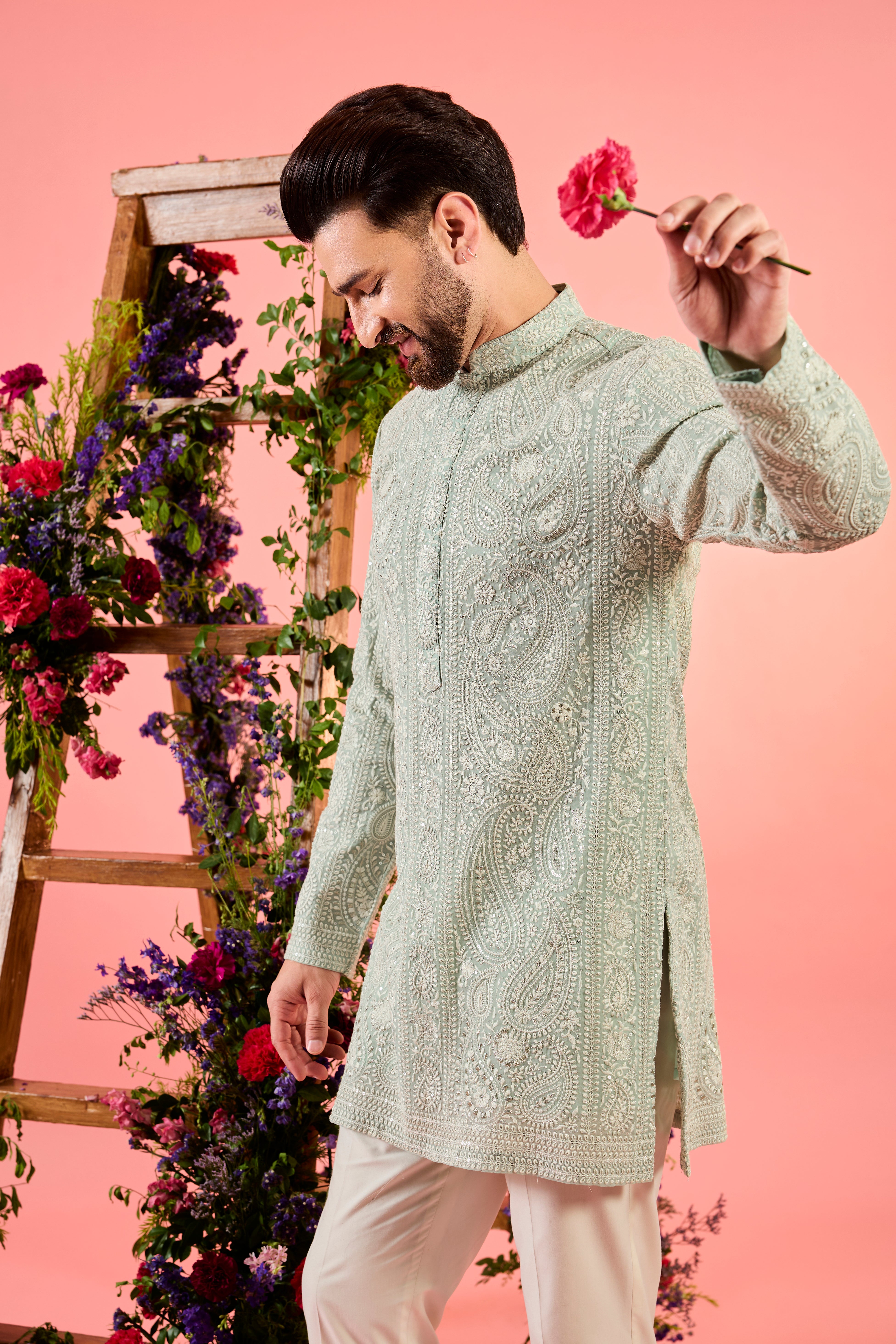 blue chikankari short kurta with floral embroidery