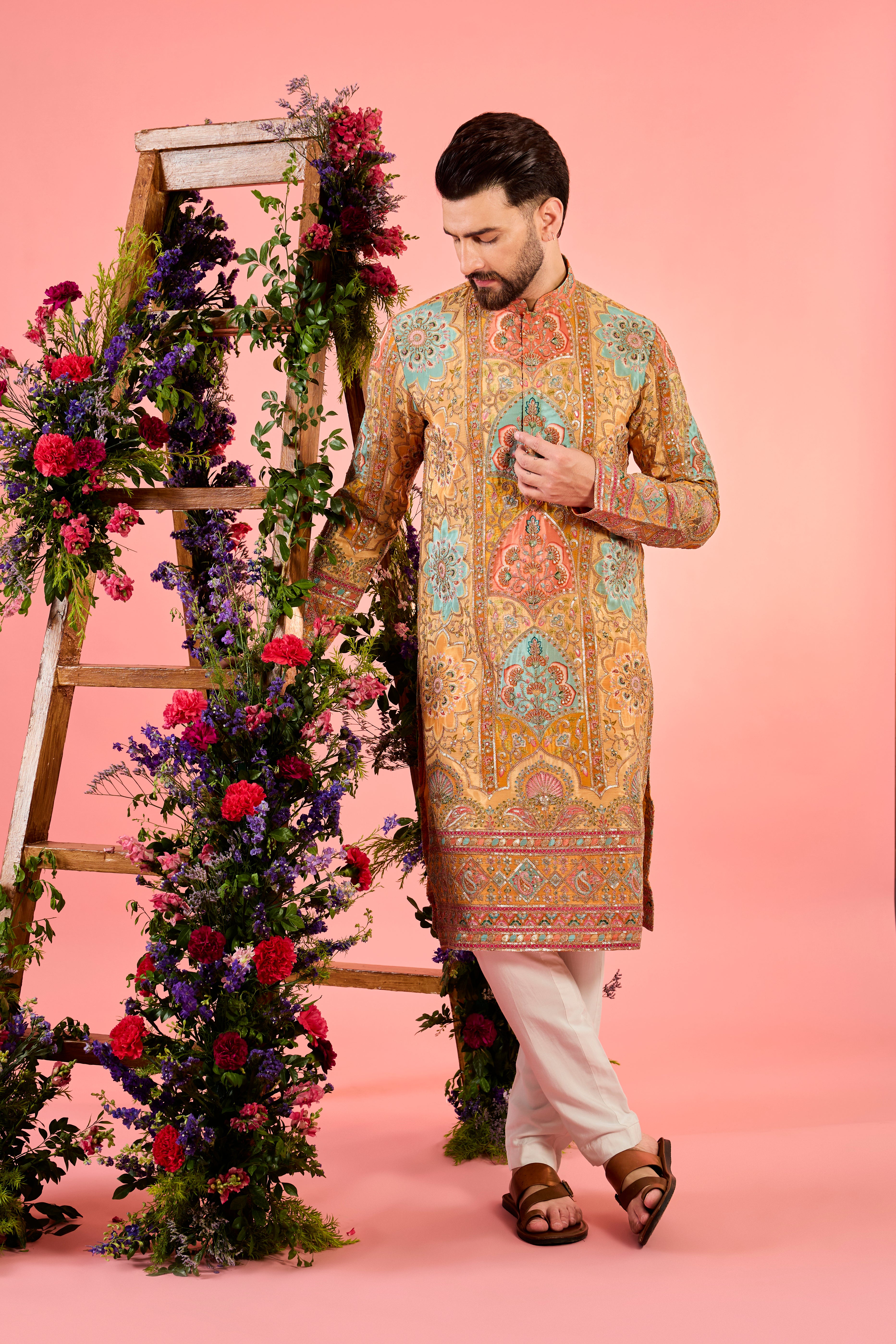 mustard chikankari kurta with intricate multi coloured floral embridery