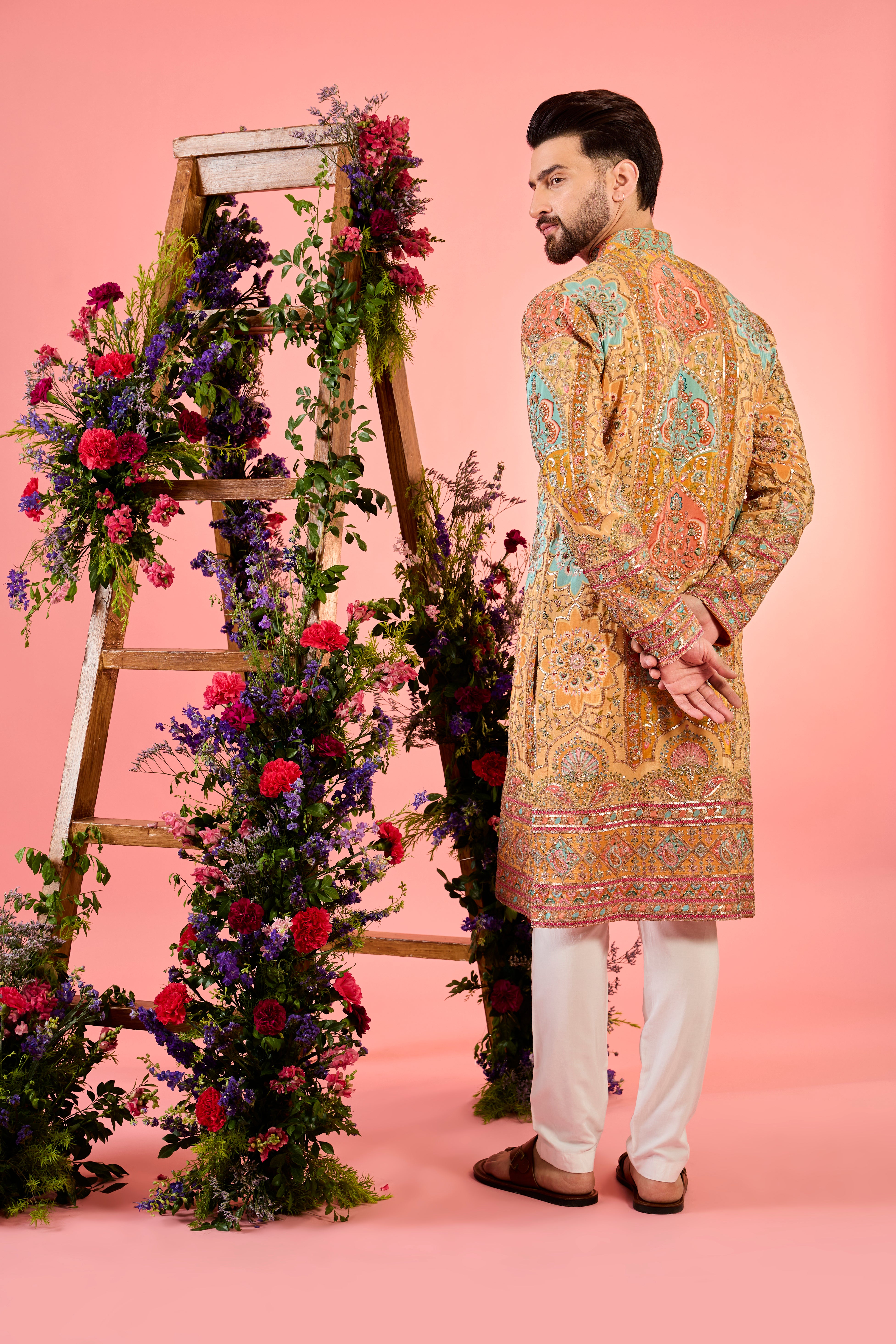 mustard chikankari kurta with intricate multi coloured floral embridery