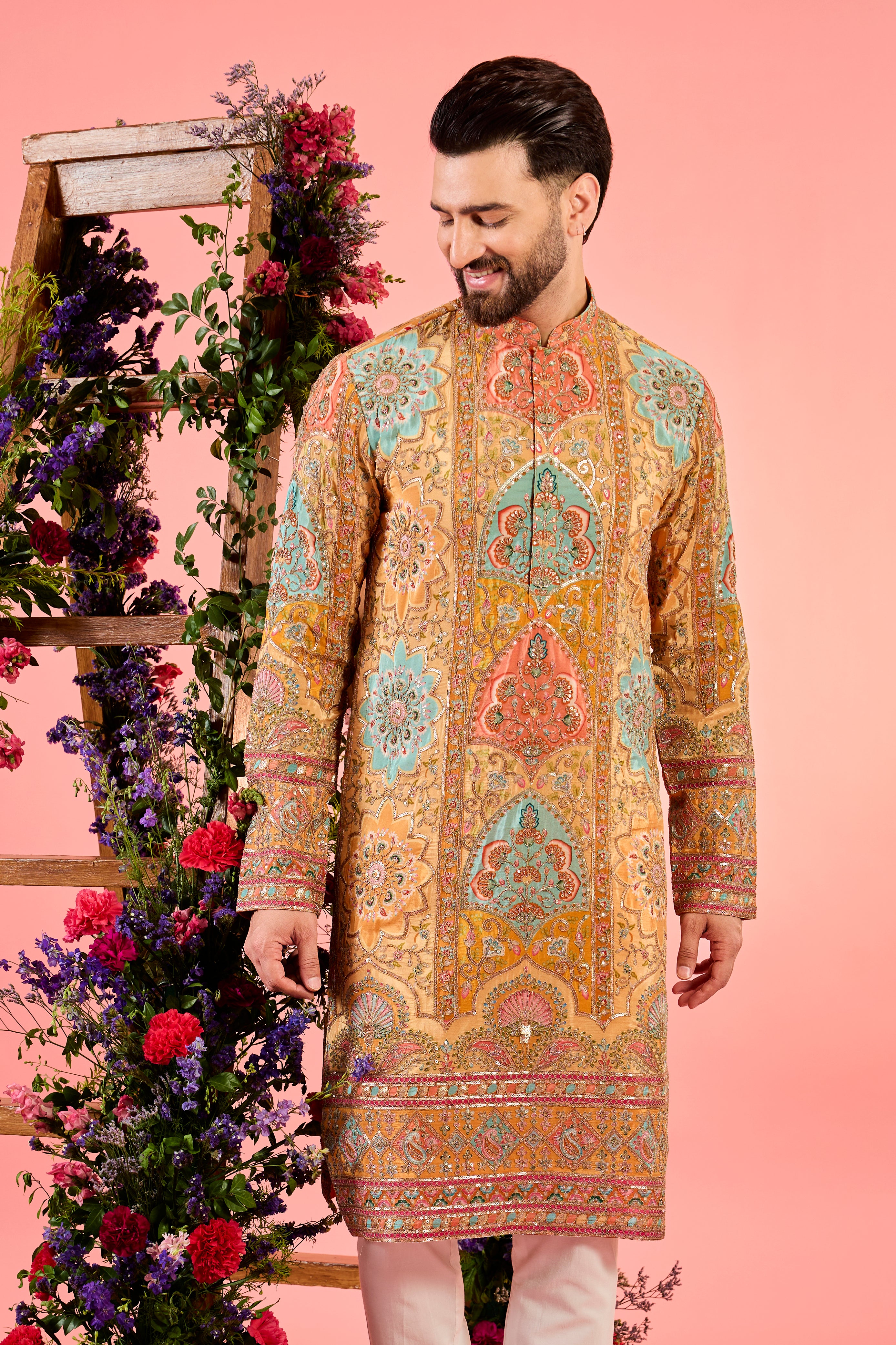 mustard chikankari kurta with intricate multi coloured floral embridery