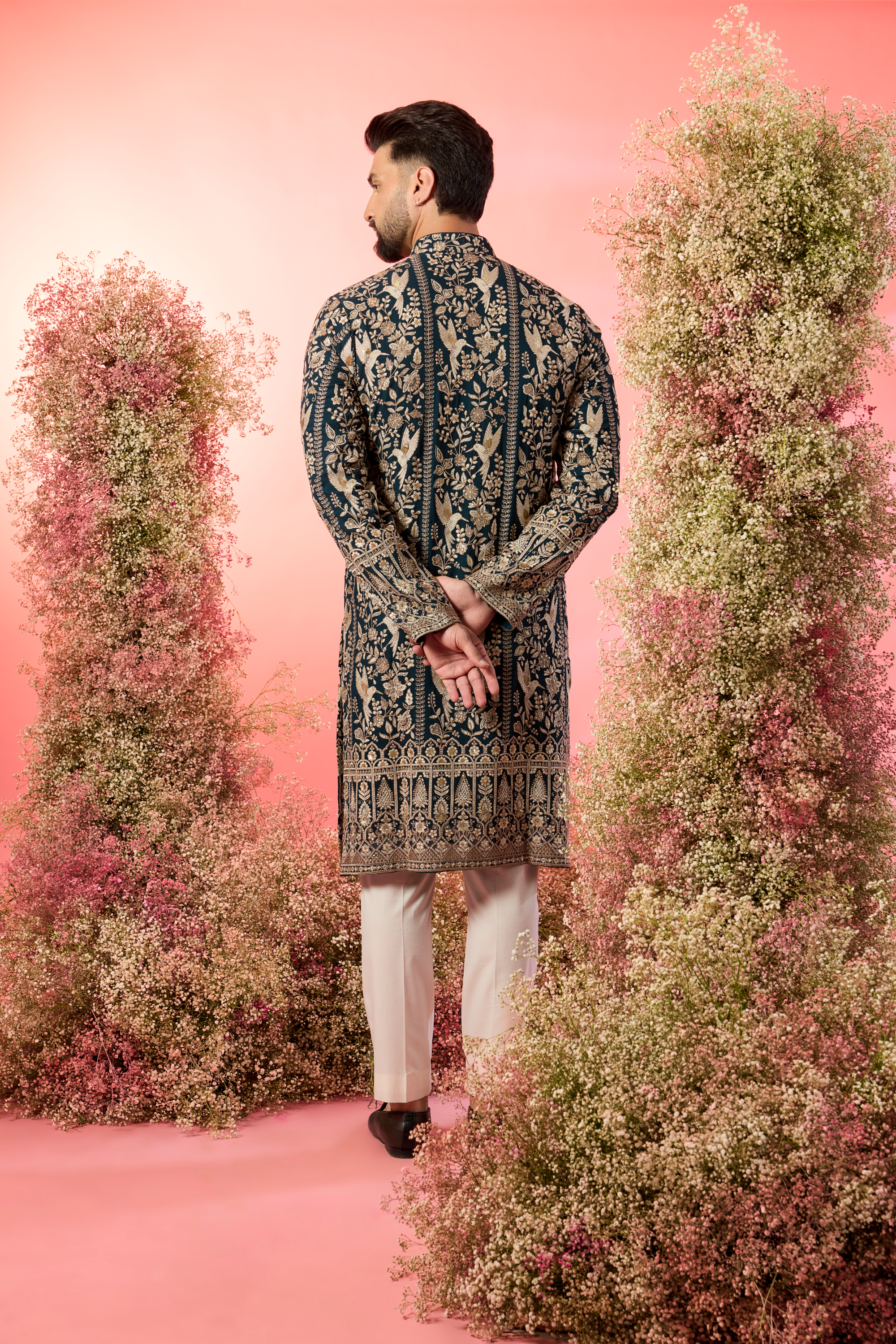 teal chikankari kurta with inricate zari , flora and fauna embroidery
