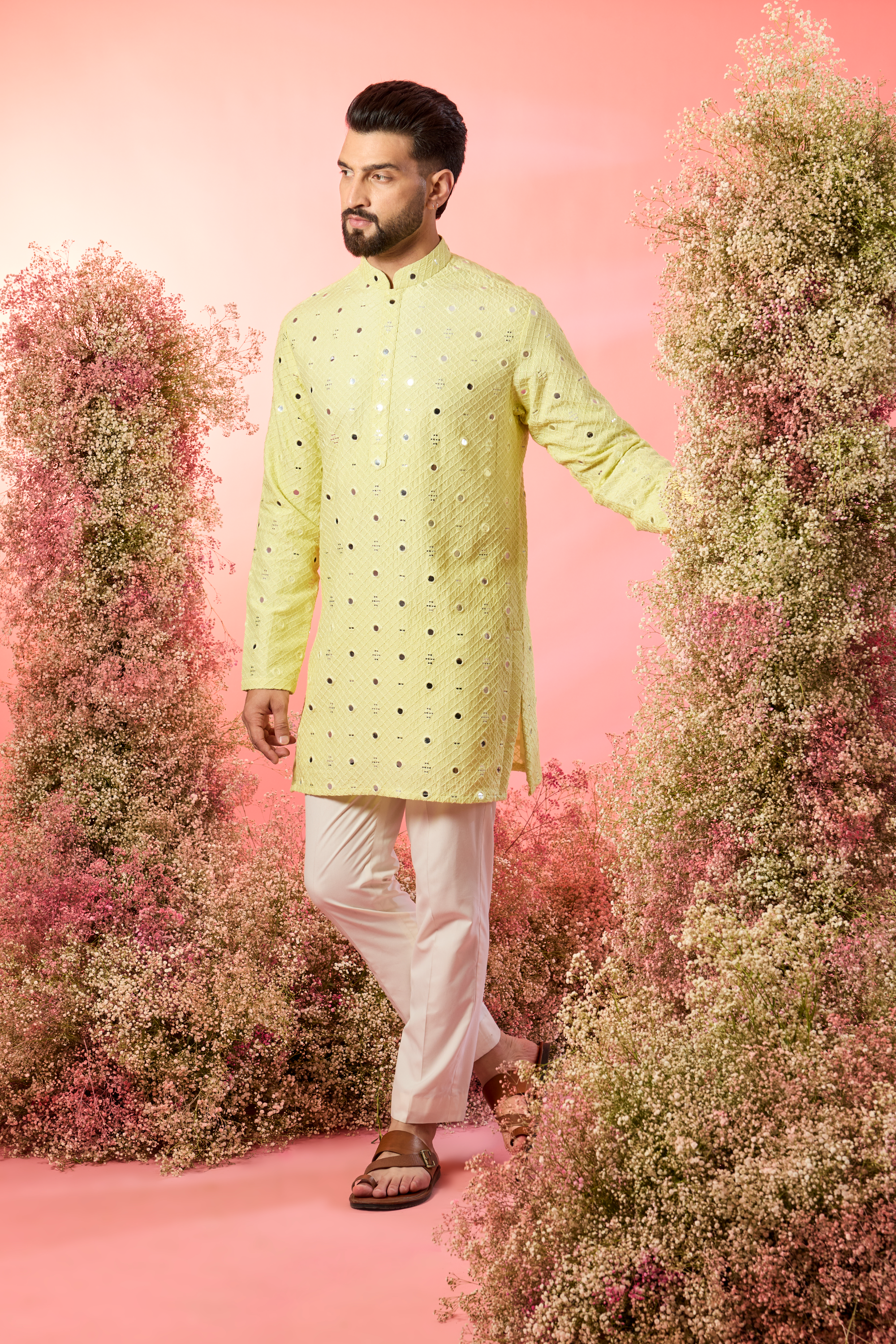 yellow short kurta with delicate mirror work